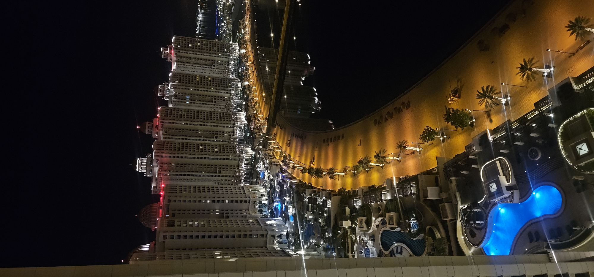 Aerial night views over The Pearl-Qatar's waterfront towers