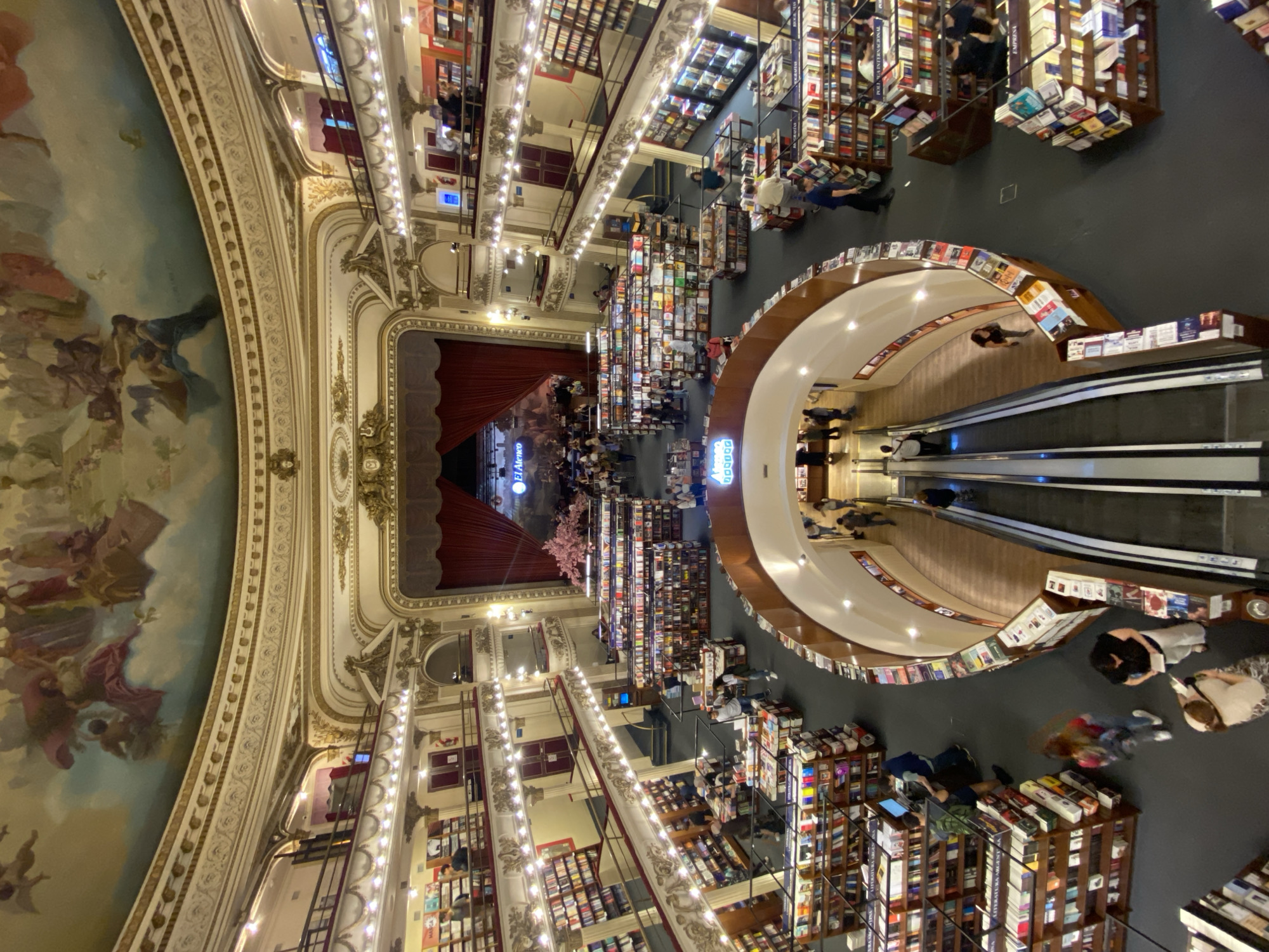 Visitors explore iconic Buenos Aires bookstore and theater venues