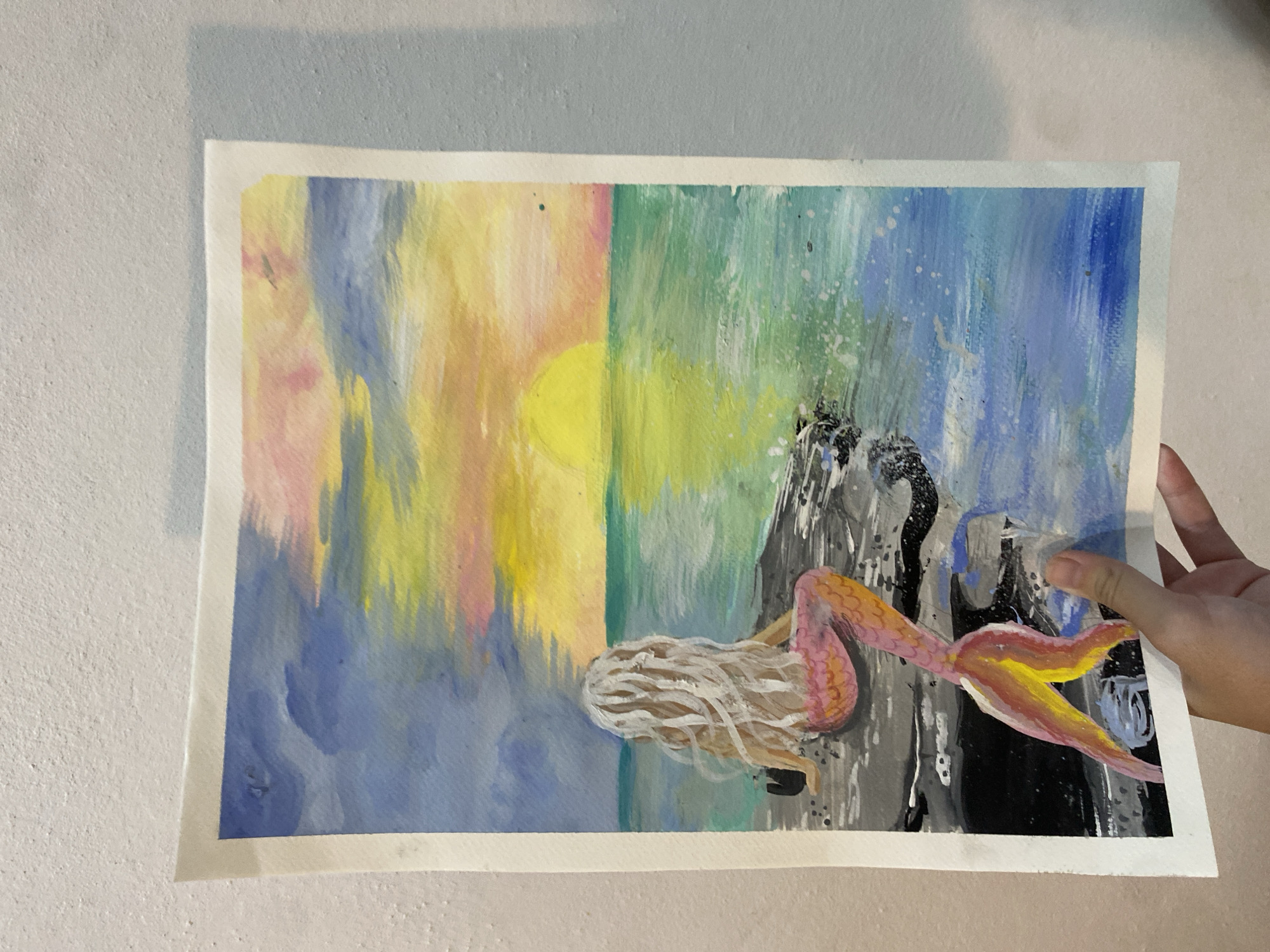 A series of original watercolor and pencil artworks on display