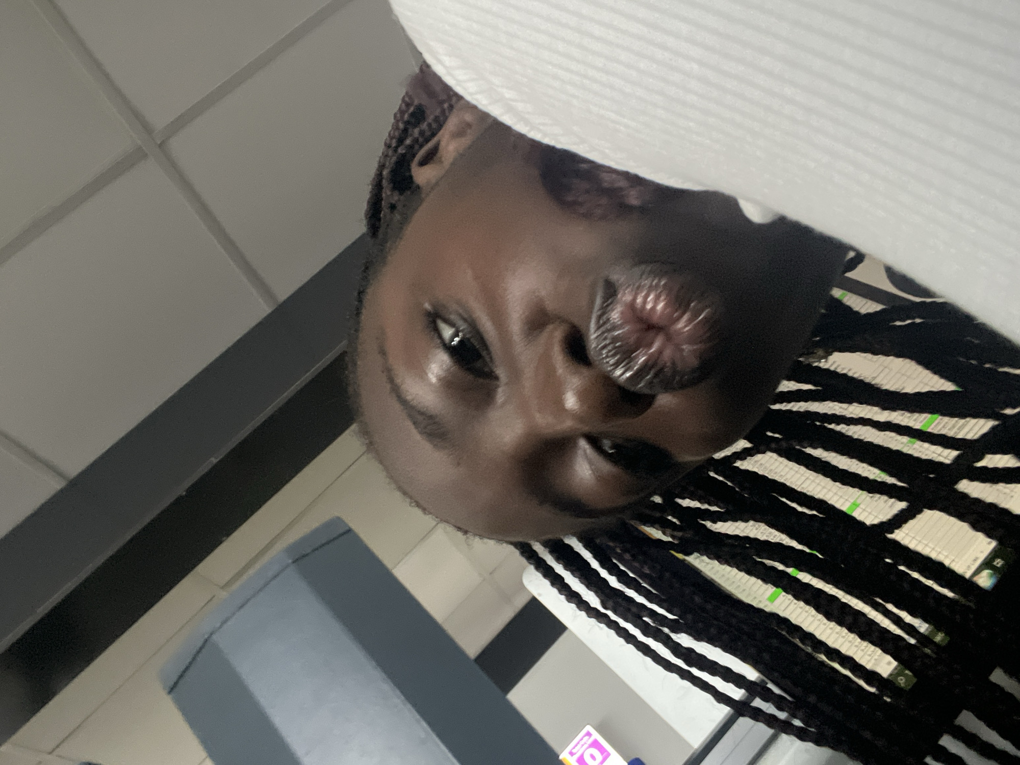 Woman photographed at office workspace in Karum, Nigeria