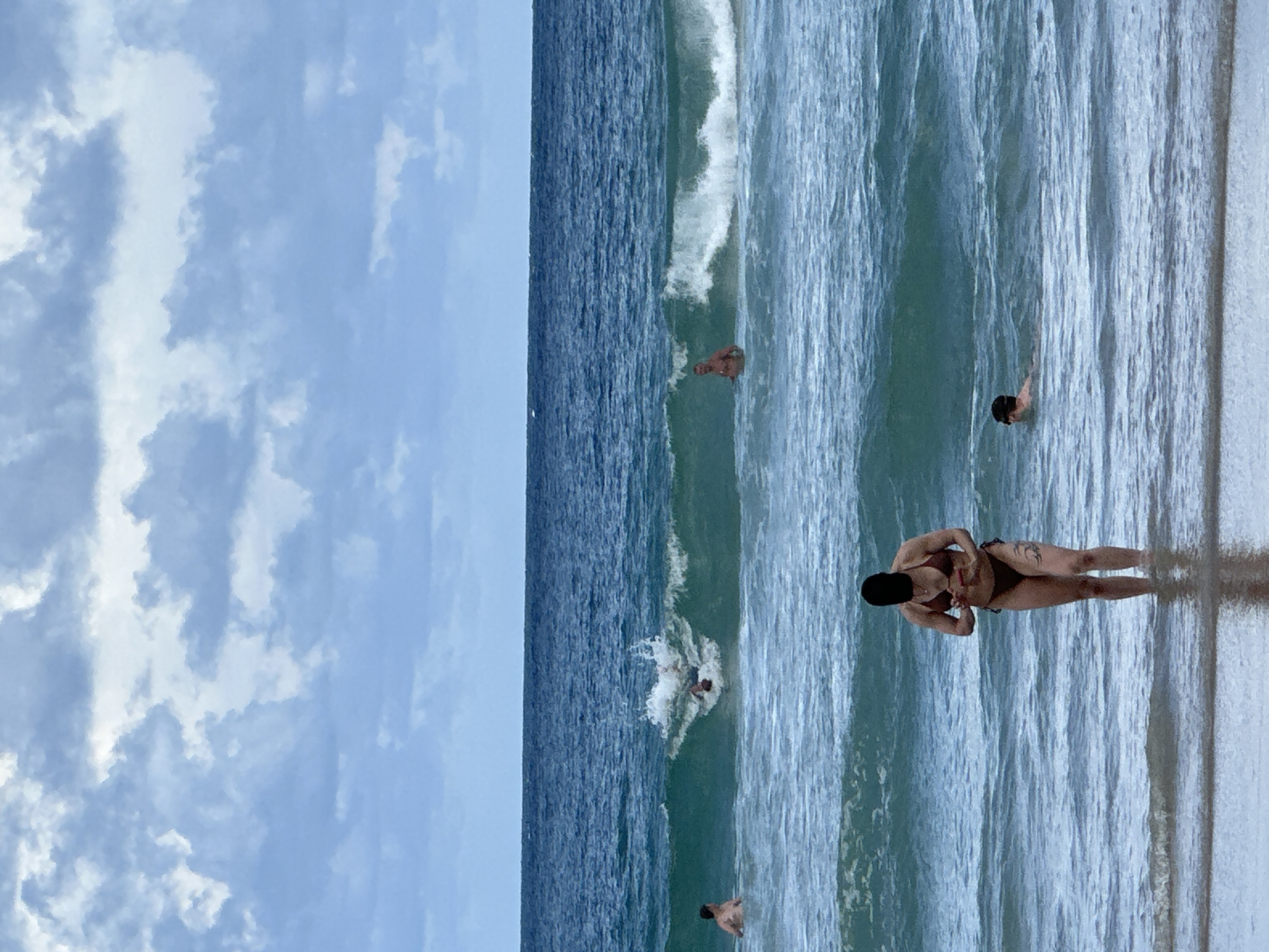 Lazy afternoon at Karon Beach, cloudy skies, easy pace.
