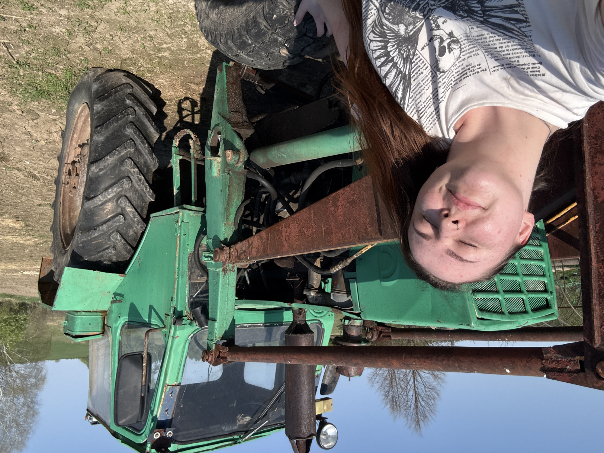 Rural life moments documented in Lukintsy, Russia during spring morning