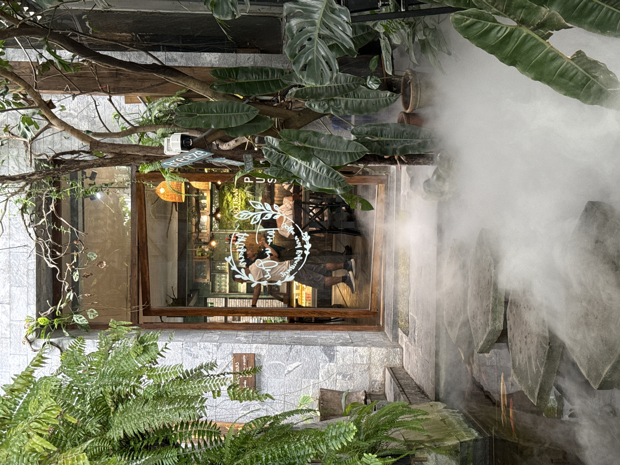 Inside a lush, koi pond cafe in Nha Trang, Vietnam