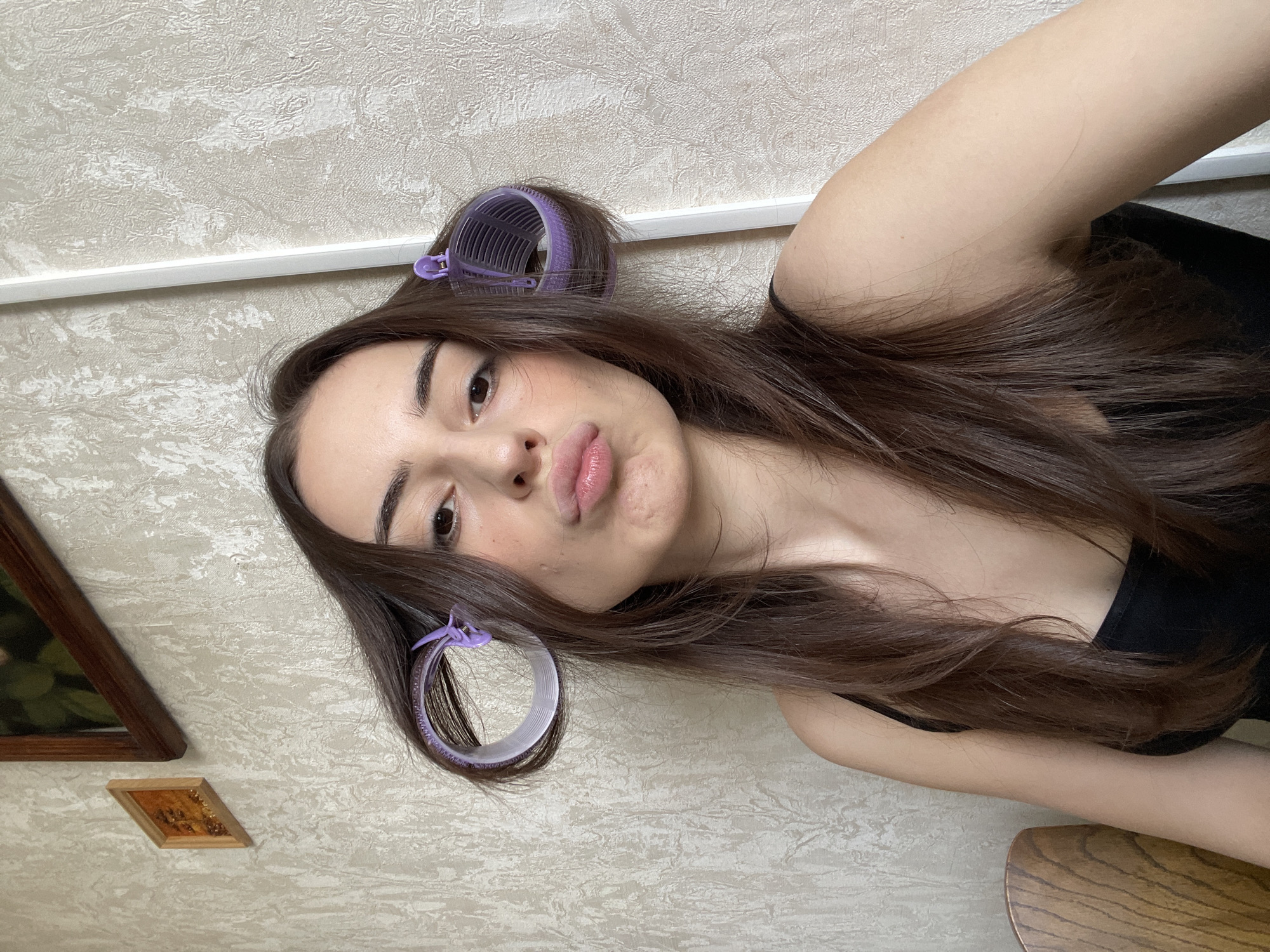 Woman conducts morning beauty routine in Moscow apartment