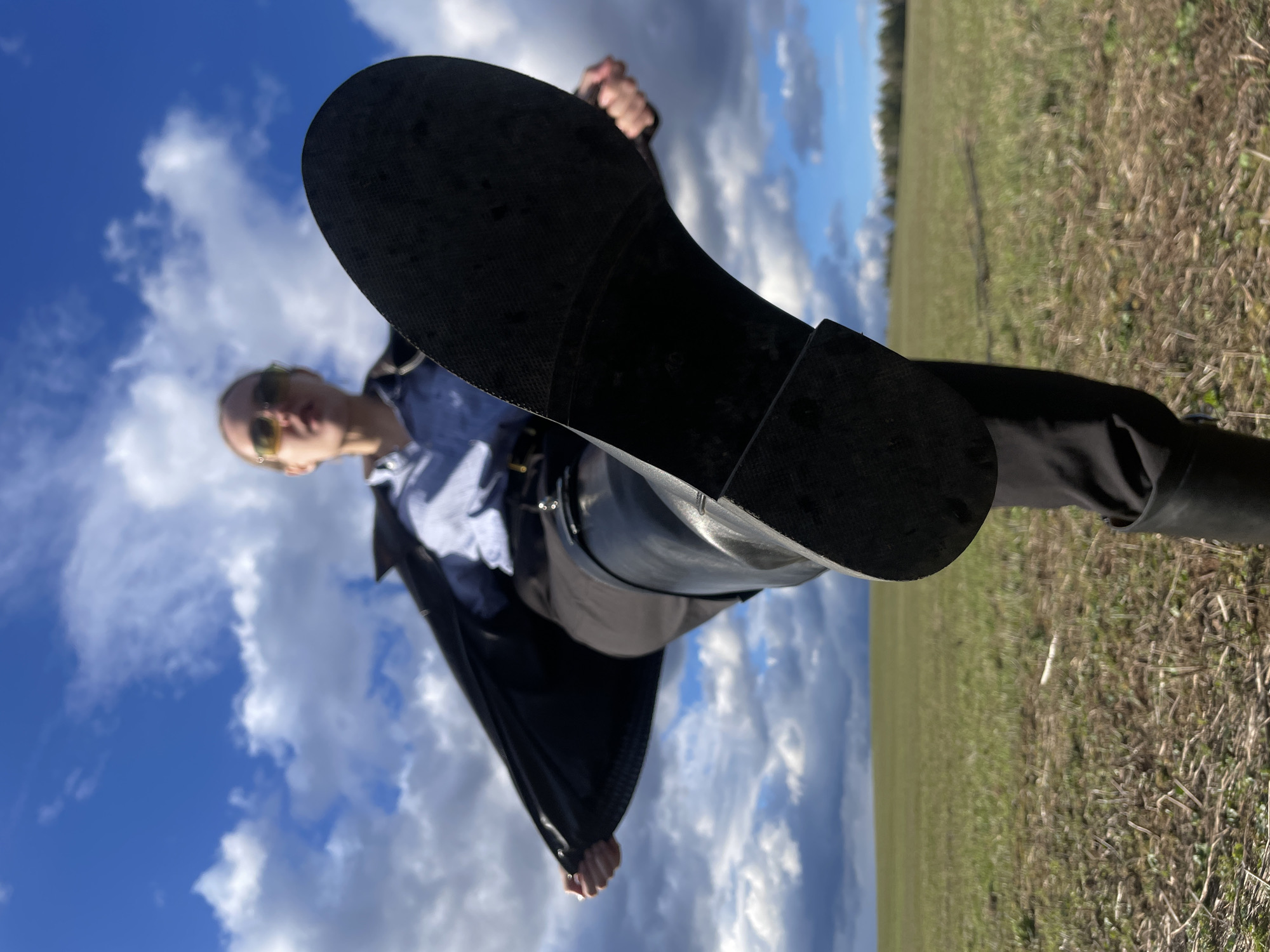 Man photographed in rural Russian fields near Udmurt settlements