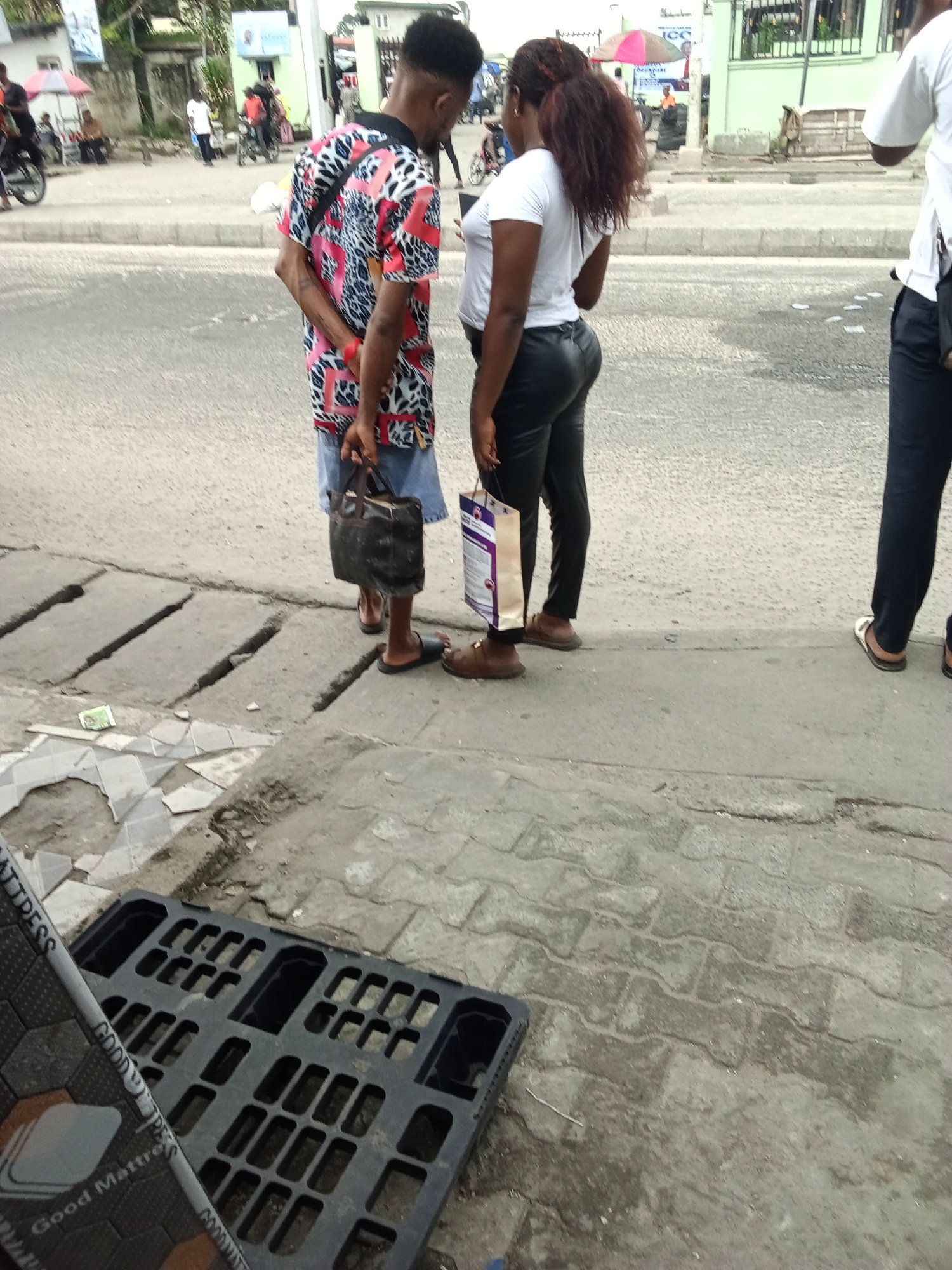 Ordinary street life captured in unidentified city during morning hours