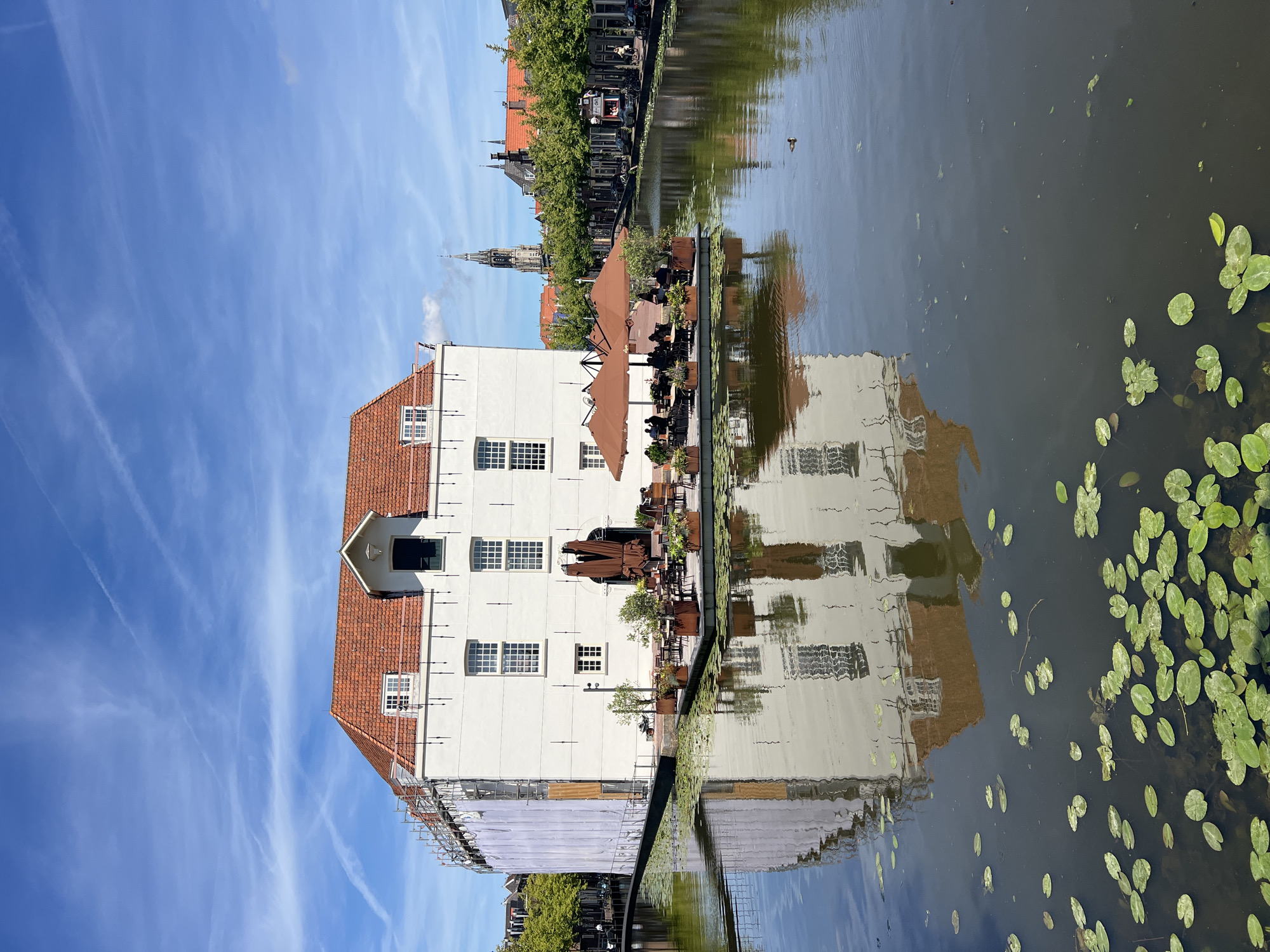 Sunny afternoon on the canals of Delft