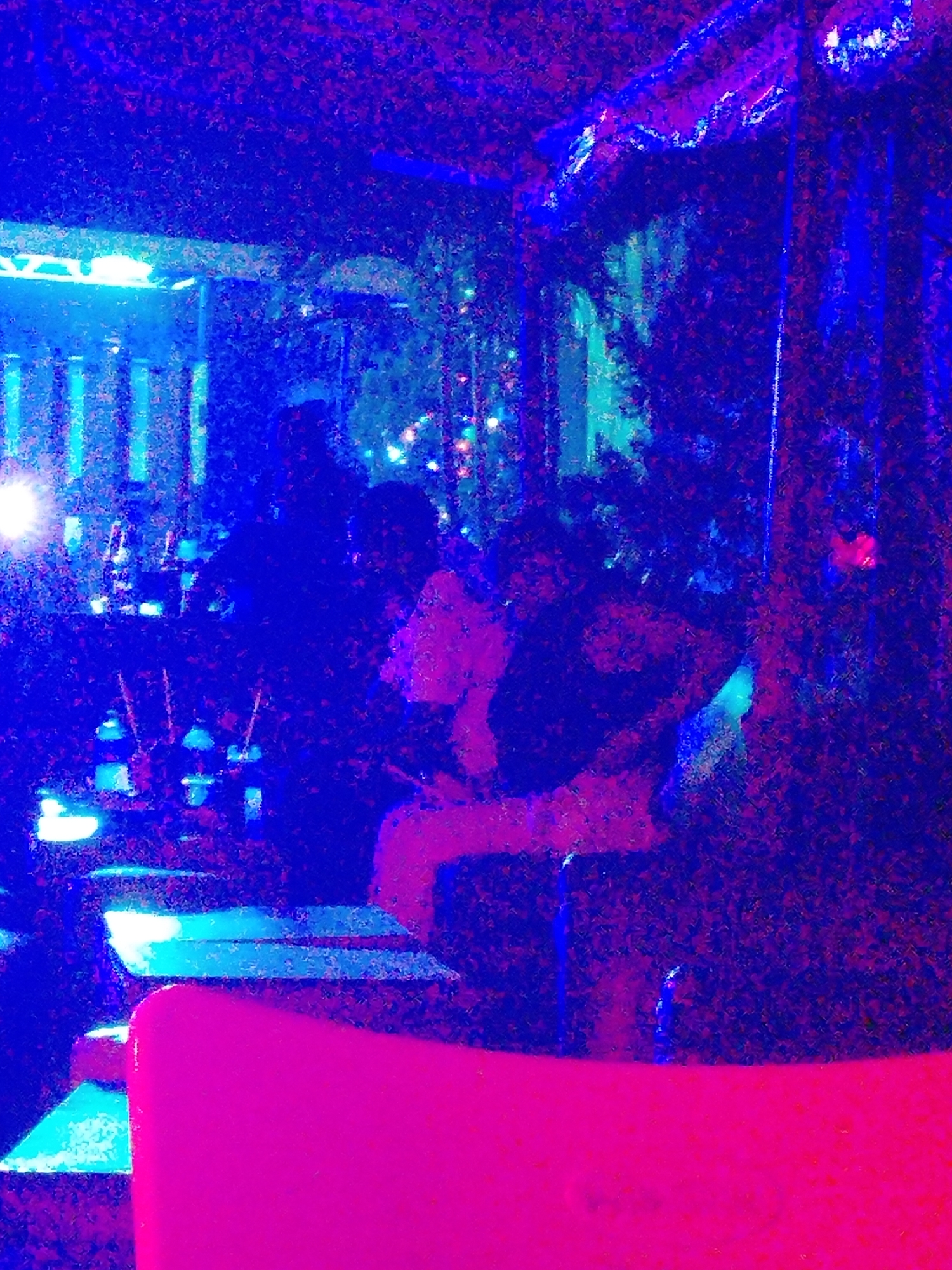 Nightlife venue captured in vibrant lighting in Yelwa, Nigeria