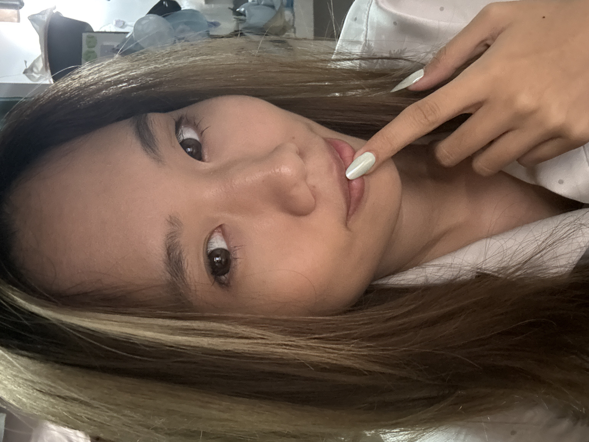 Woman takes selfies indoors in Nan'an District, China