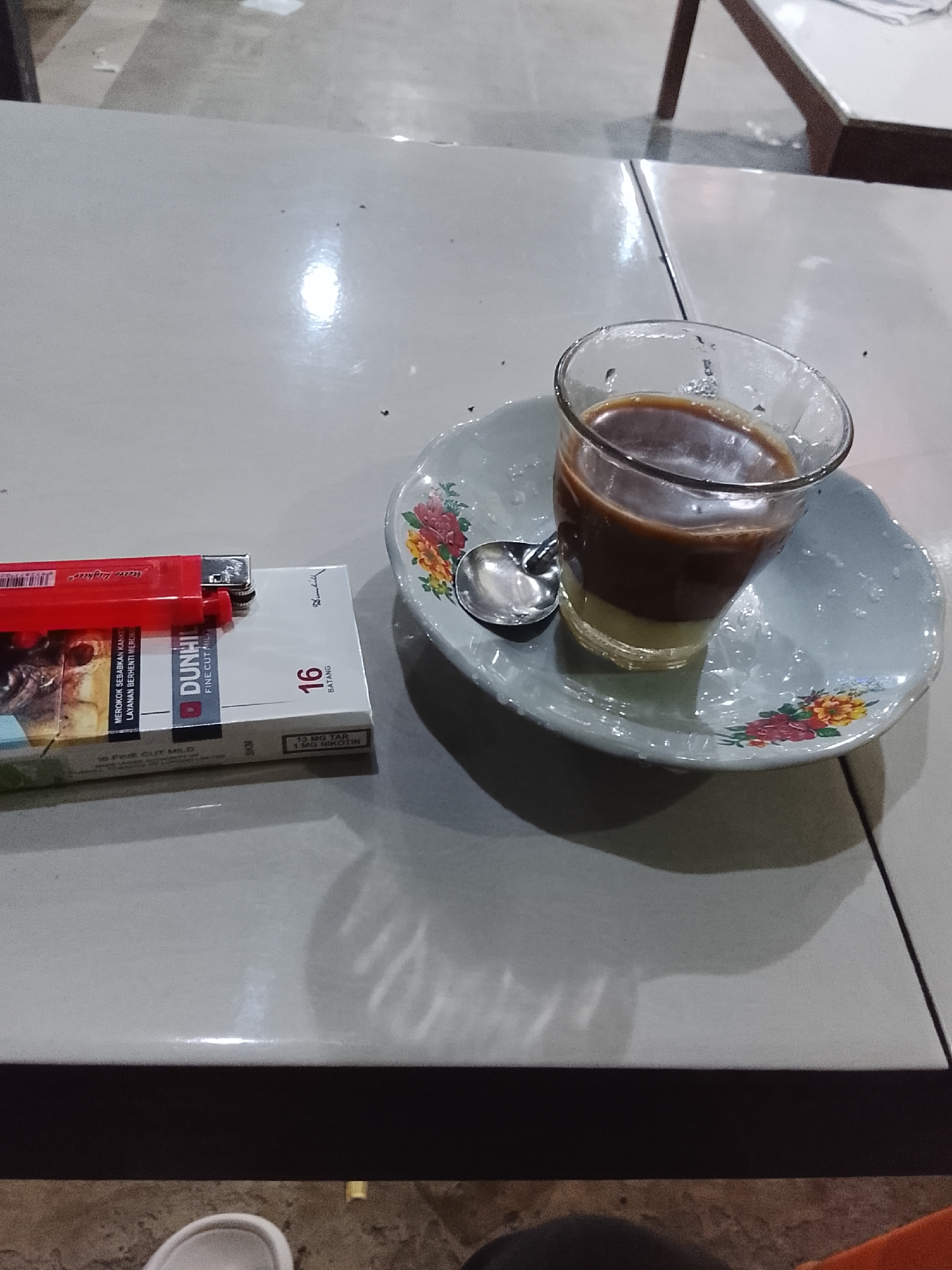Nighttime food stall scene in Aceh with coffee, scooters, and patrons
