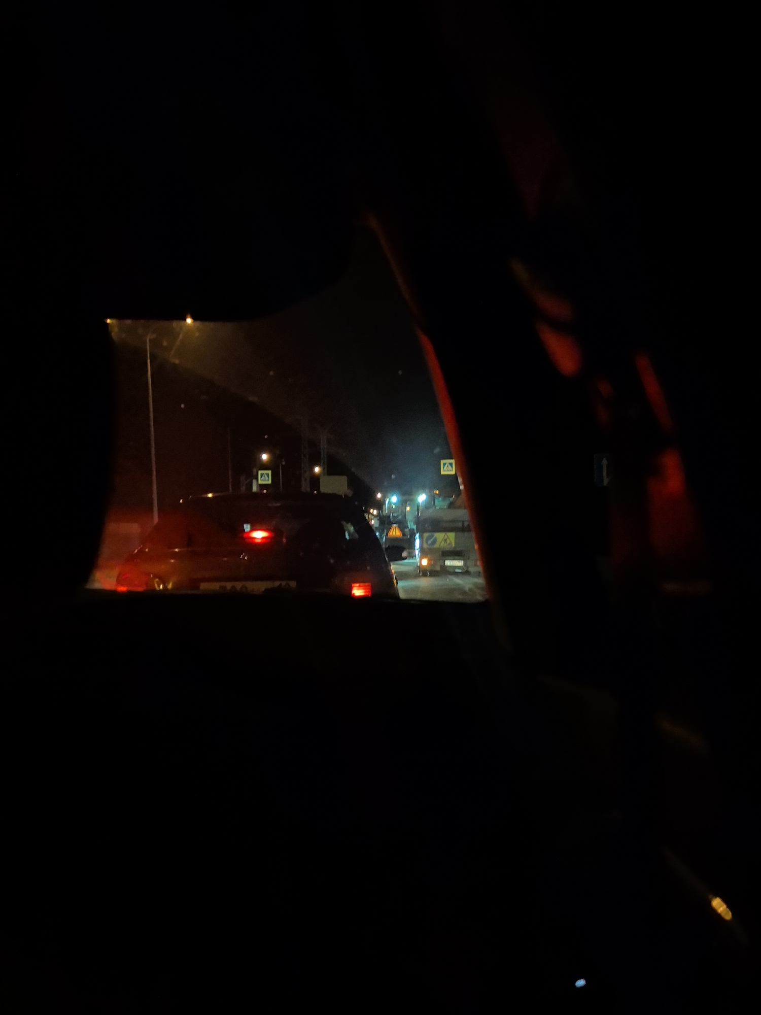 Night traffic scene documented in Chaikovsky, Russia