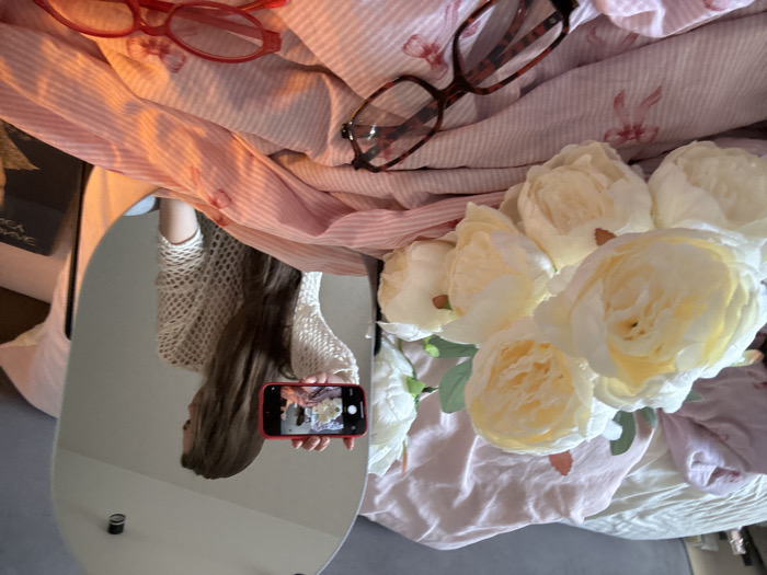Personal beauty routine and selfie session captured in Krasnodar bedroom
