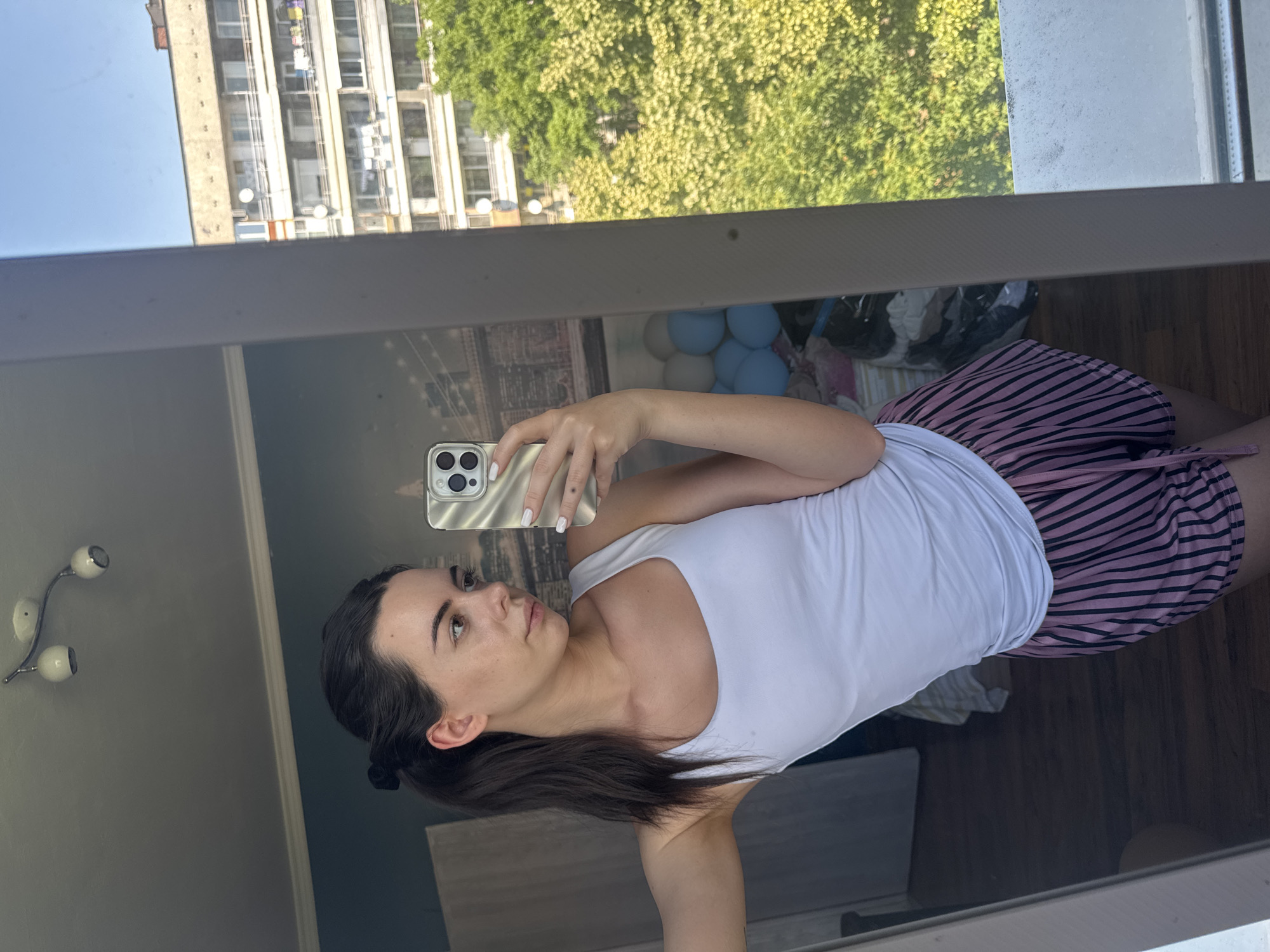 Woman documents selfie session ending with chocolate cake
