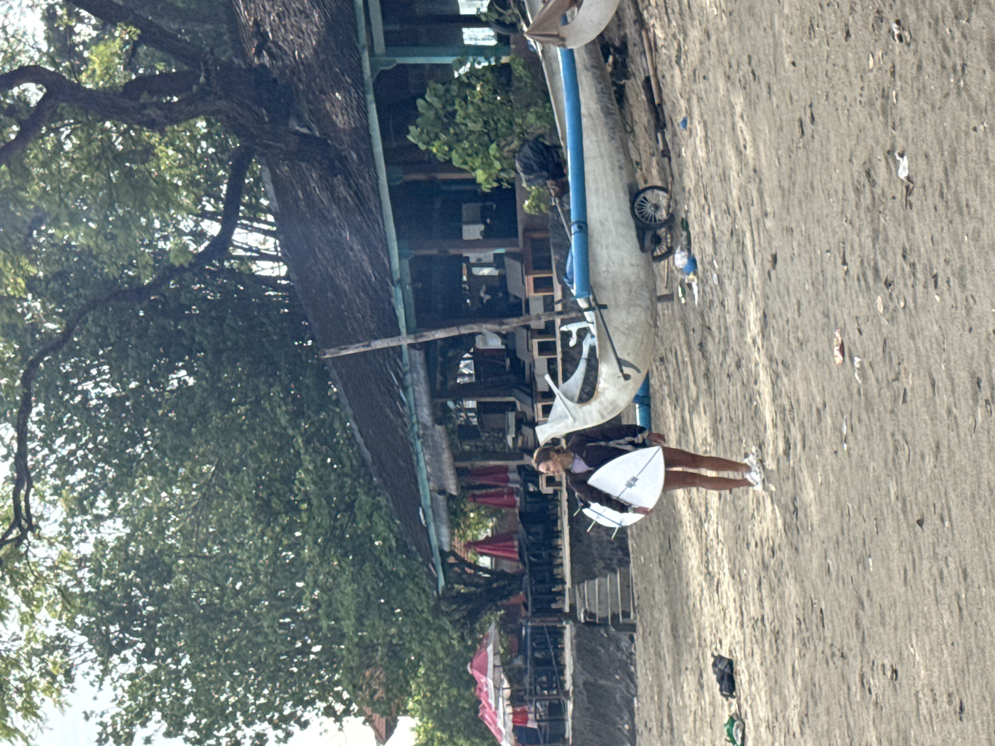 Early morning beach activity captured at Kuta Selatan, Indonesia