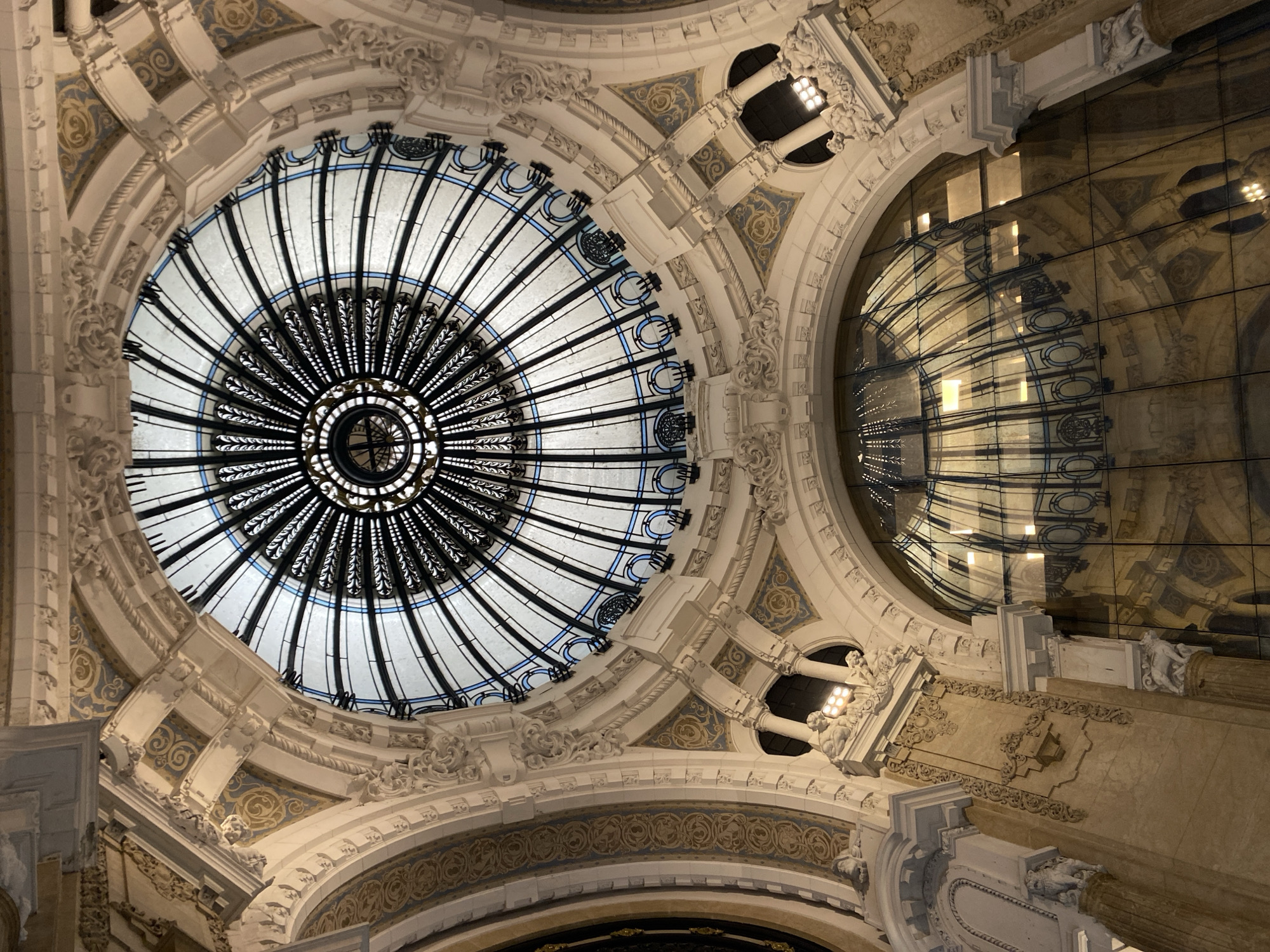 Tourist documents Buenos Aires architectural landmarks during downtown walking tour