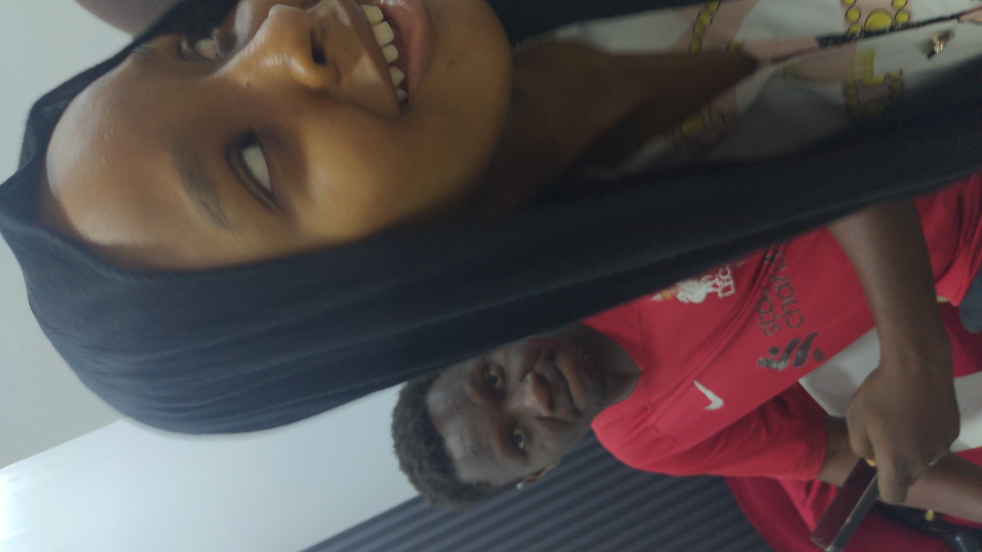 Afternoon gathering around white table in Abuja office