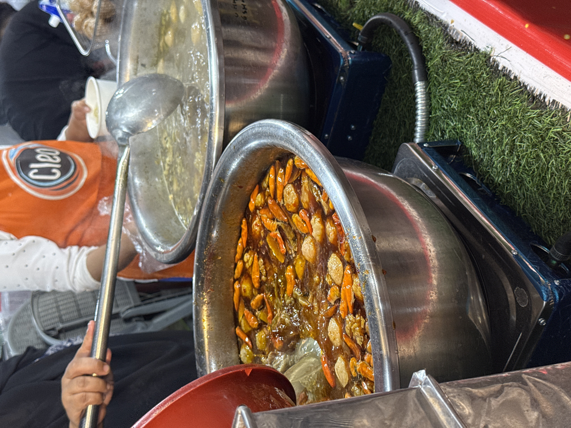 Street food vendors serve customers across Lhokseumawe, Indonesia