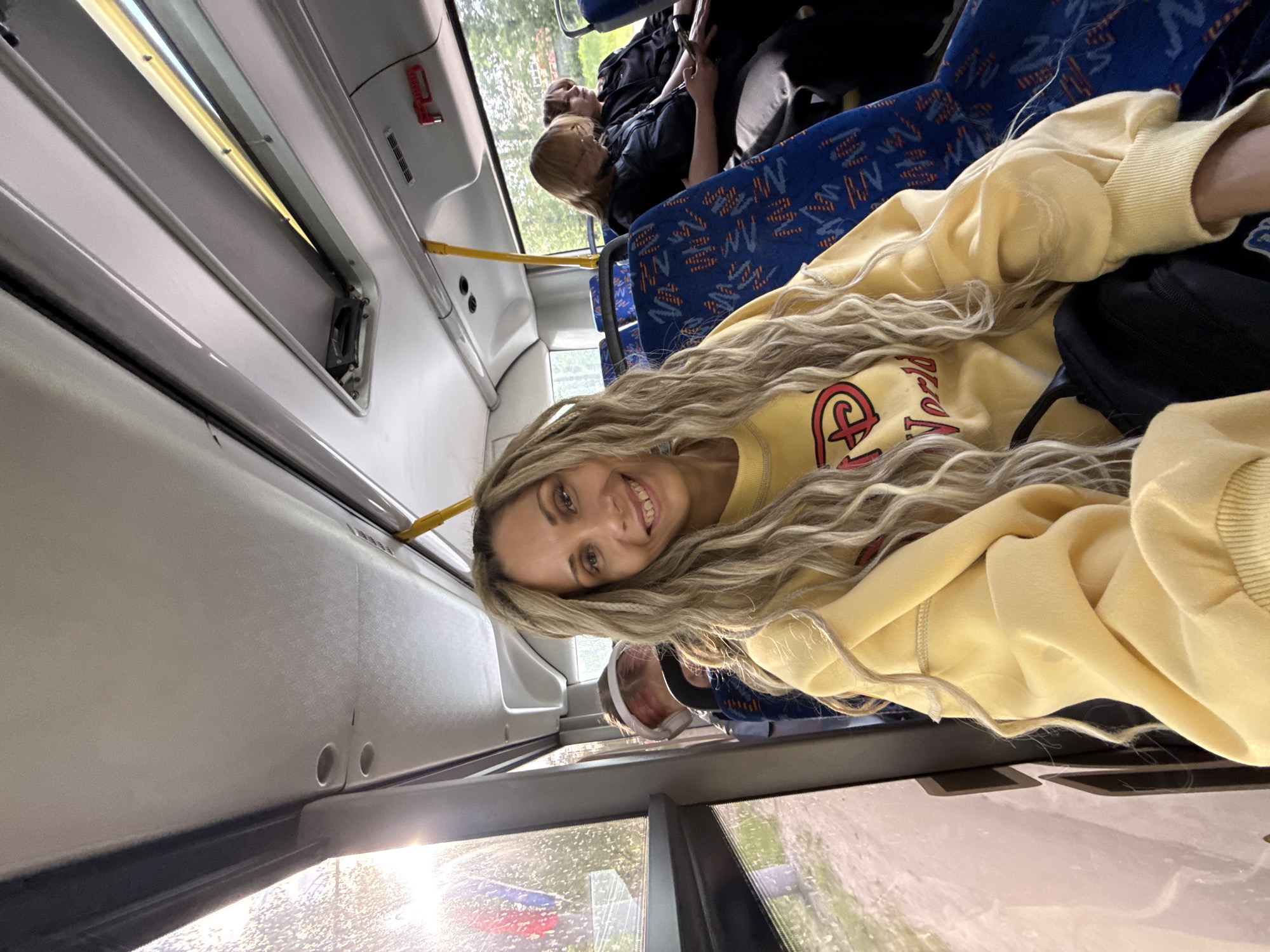 Transit scenes captured in Rusanovo: bus passenger, elevated railway view