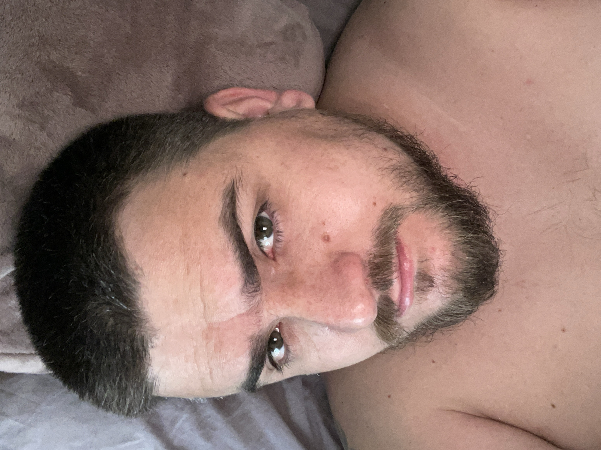 Quiet moment at rest, indoors with a fan and mineral water nearby