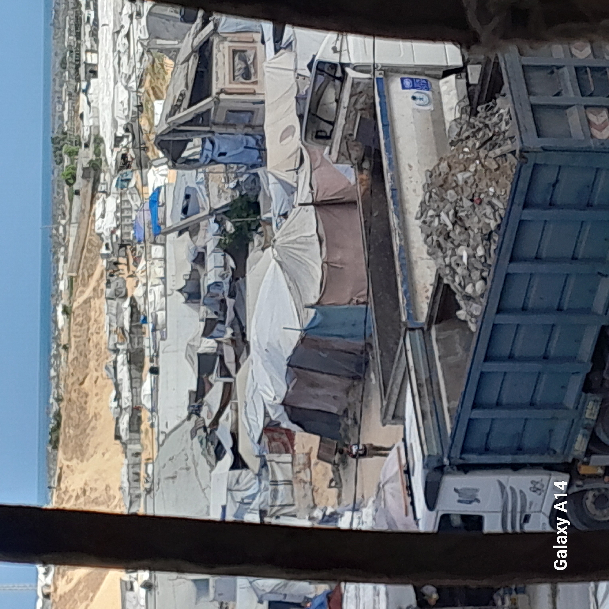 Debris cleanup continues at Khan Yunis displacement camp