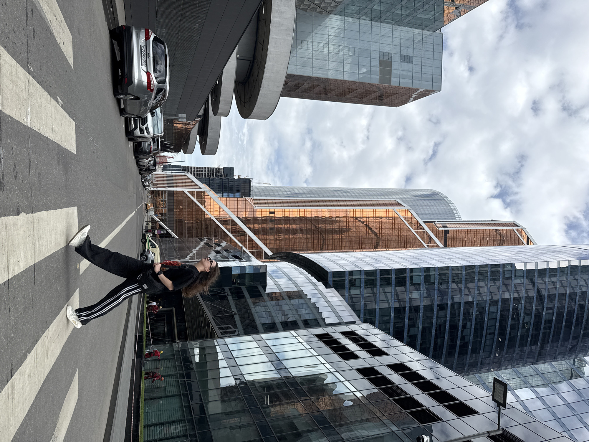 Woman on crosswalk, Lamborghini nearby in Khimki