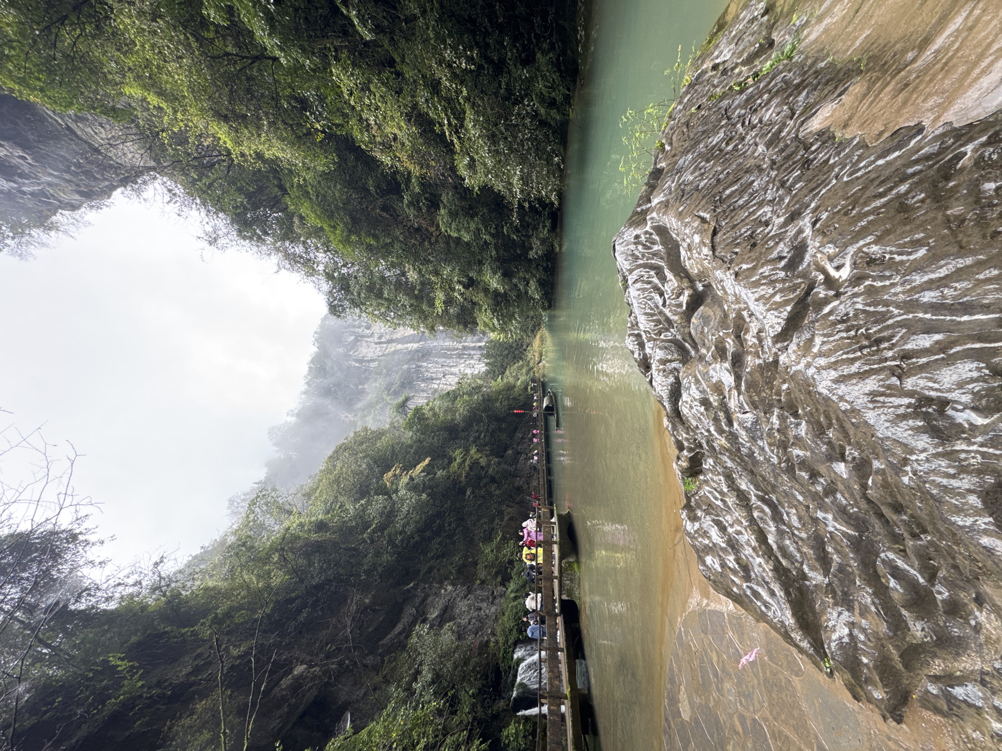 Scenic gorge and traditional boat captured in Wulong District