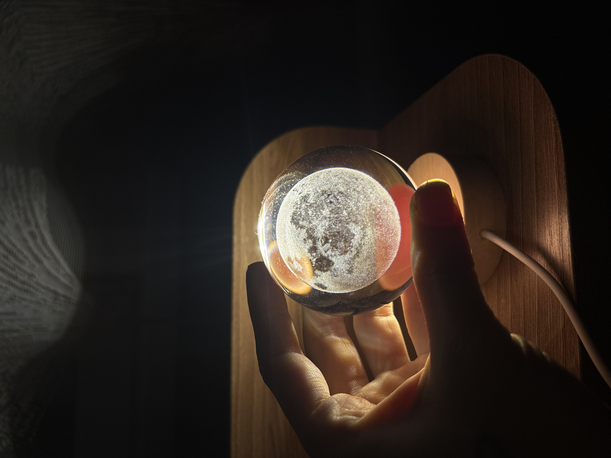 Cozy evening in: cat naps, glass spheres, and low-light selfies