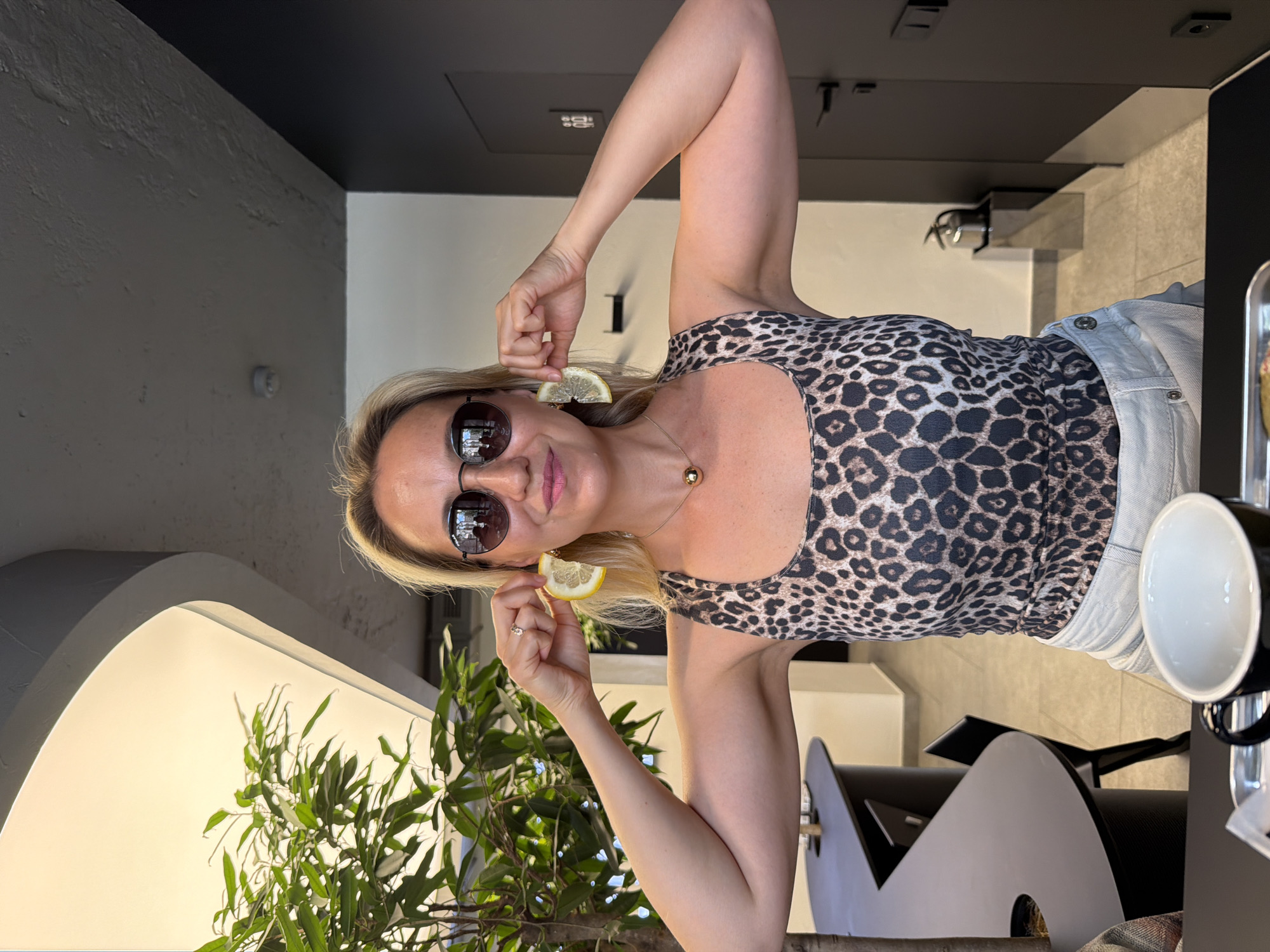 Goofing around at a café in Izhevsk over coffee and pastries