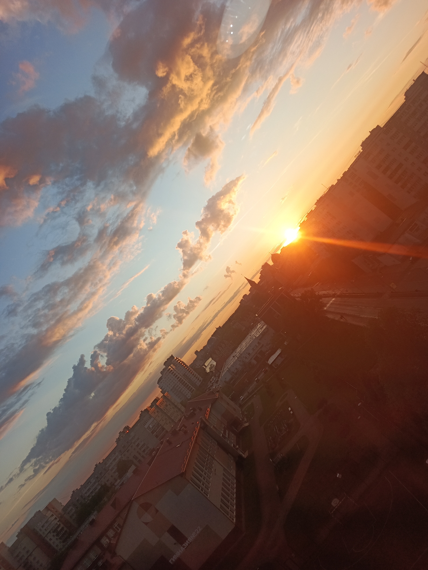 Sunset documented over Kaliningrad cityscape including cathedral landmarks
