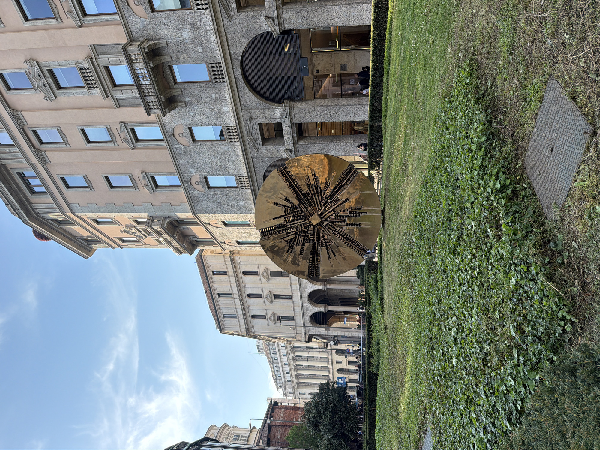 Witness documents Milan architectural landmarks during afternoon walking tour