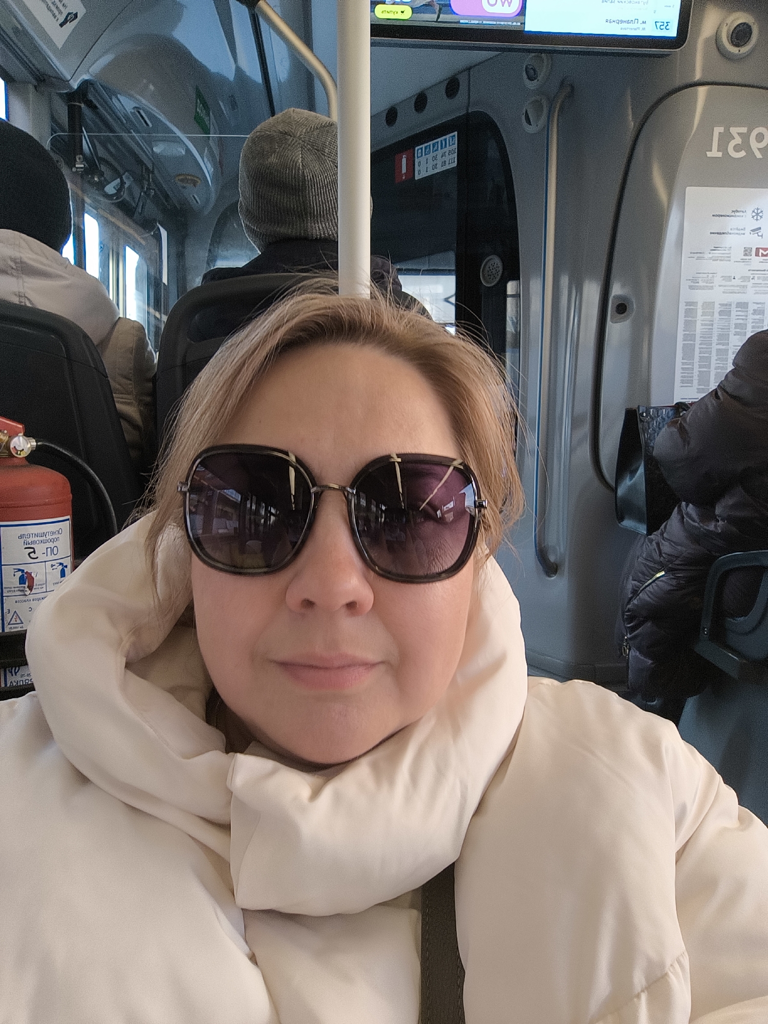 Woman Takes Selfie on Public Transport in Khimki