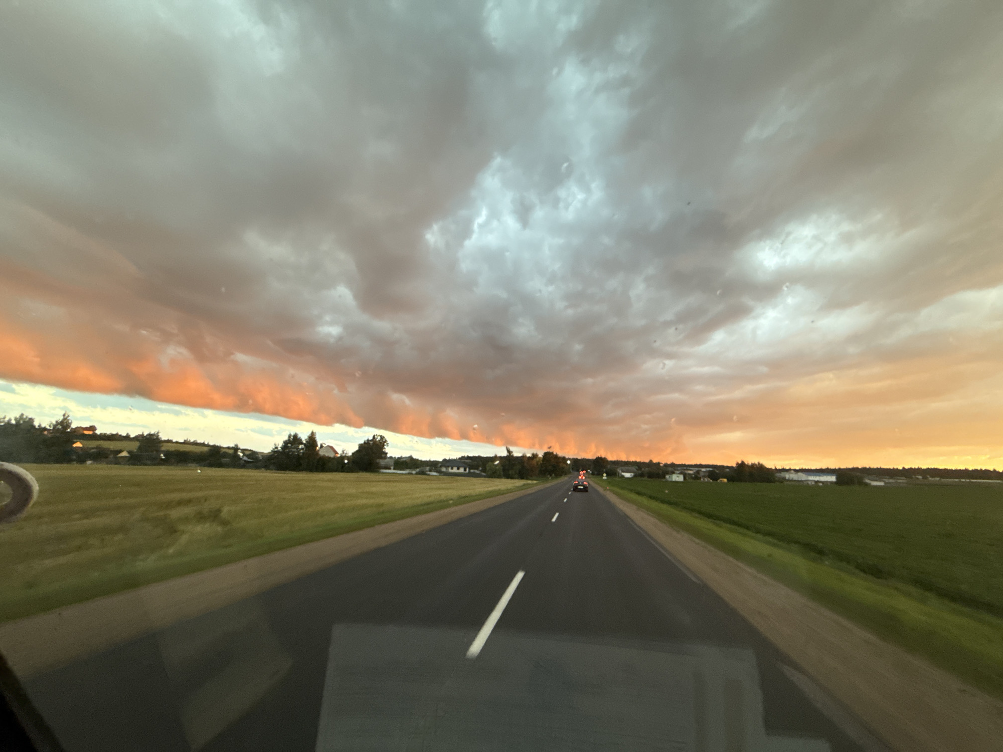 Sunset drive through rural Belarusian countryside