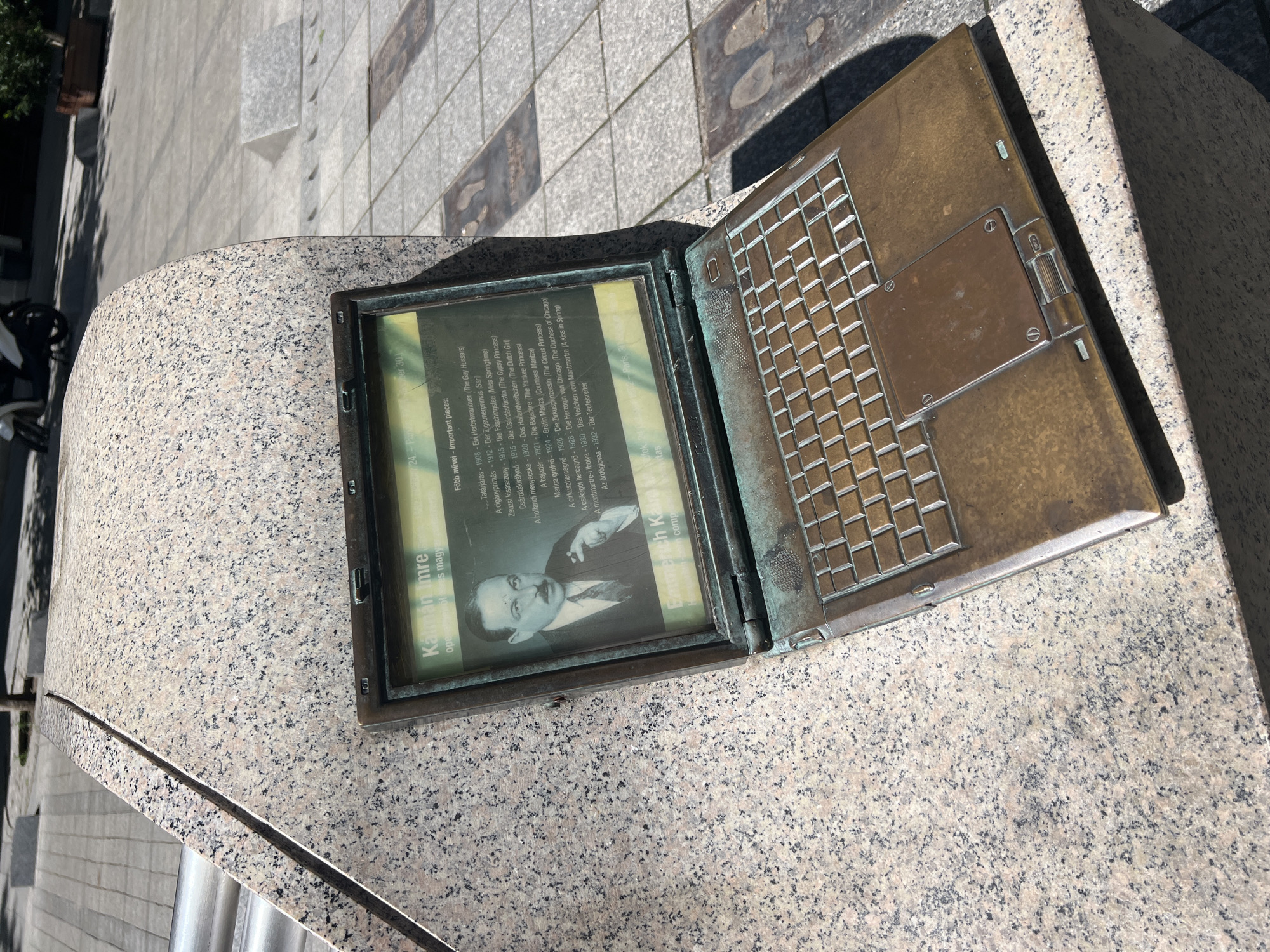 Bronze laptop memorial sculpture spotted on Budapest street