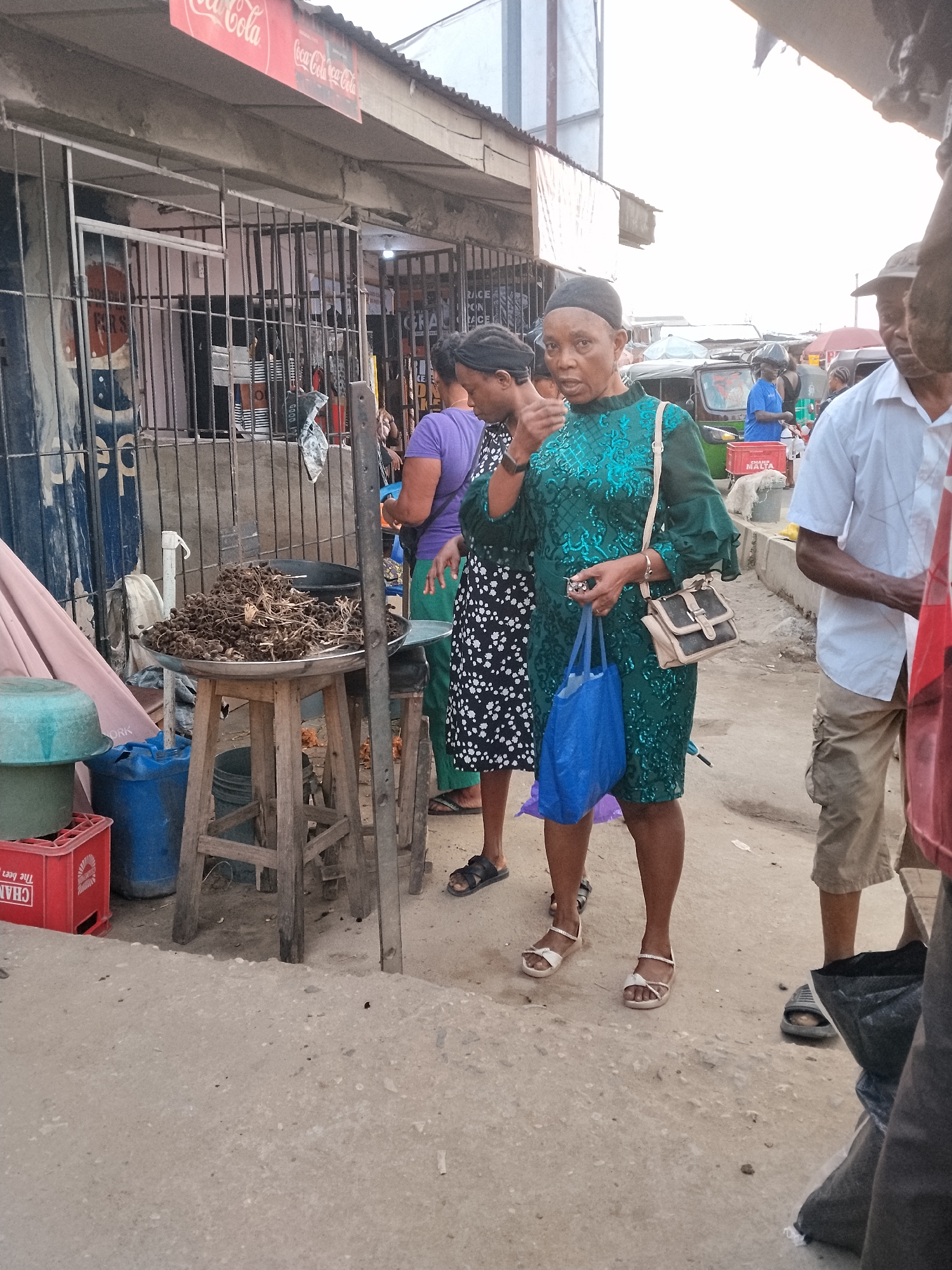 Daily market activity documented in Aba, Nigeria streets