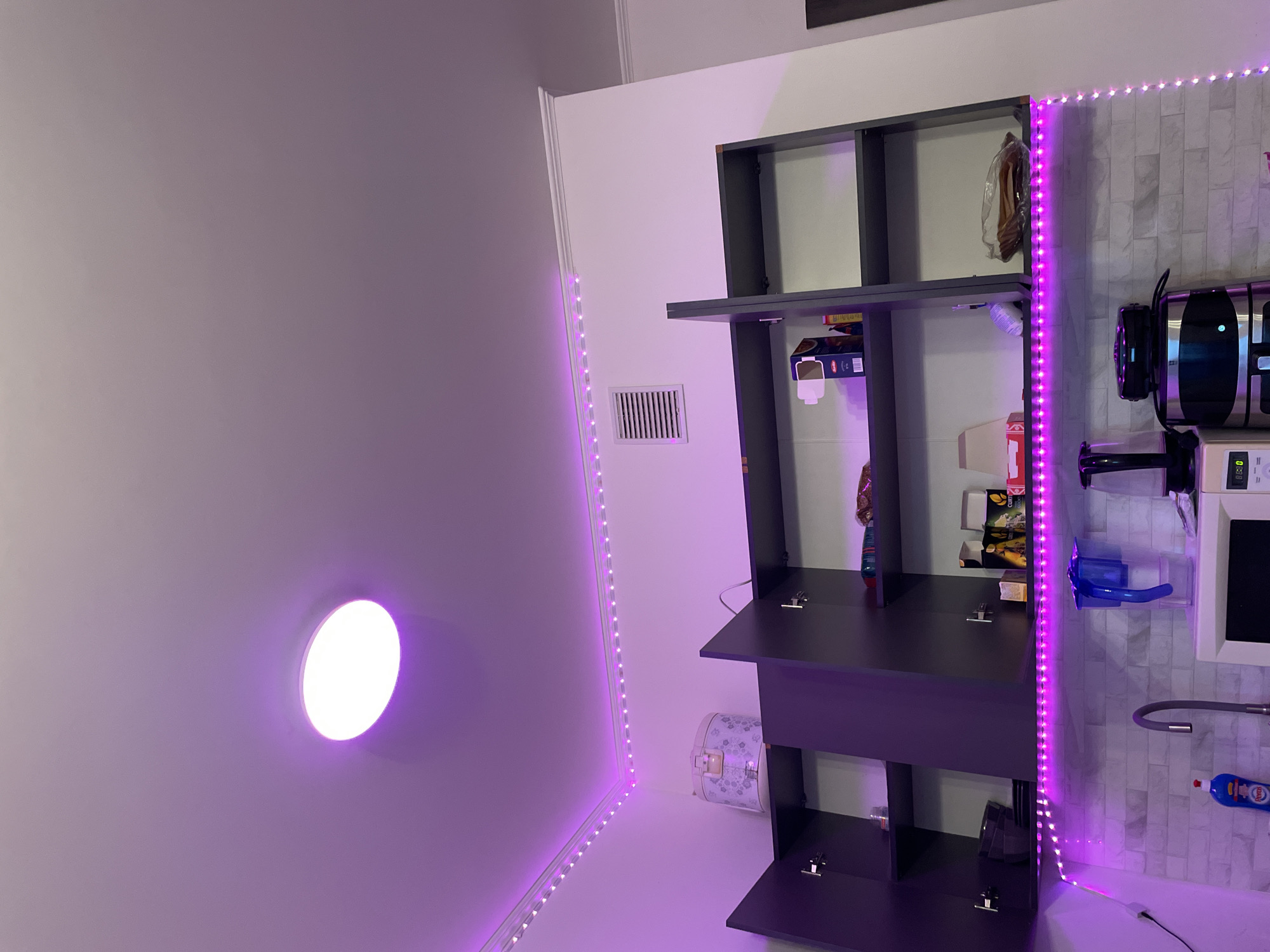 Purple LED lighting observed in Russian kitchen late night