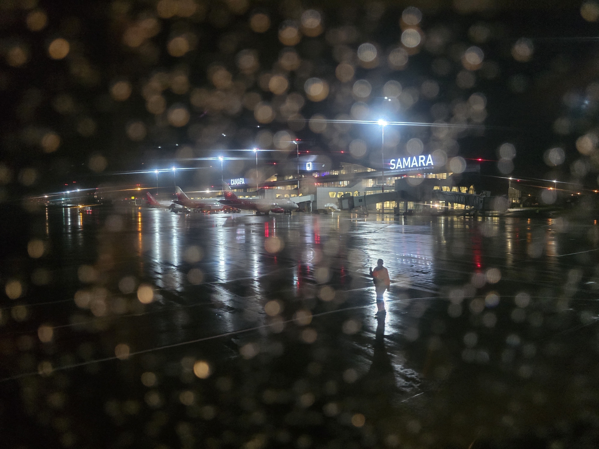 Rainy night at Samara Kurumoch Airport, seen from multiple angles