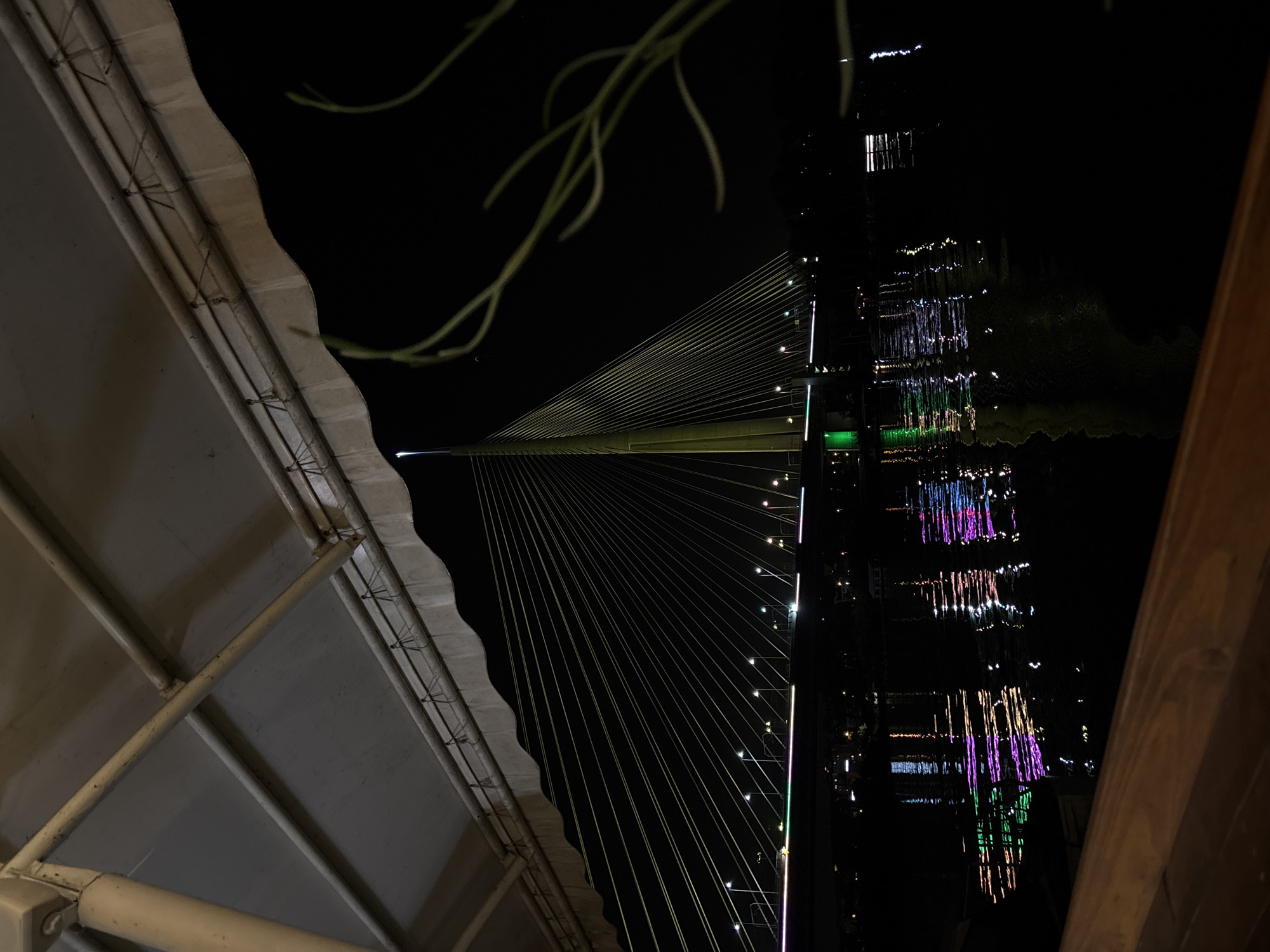 Ada Bridge illuminated at night in Belgrade