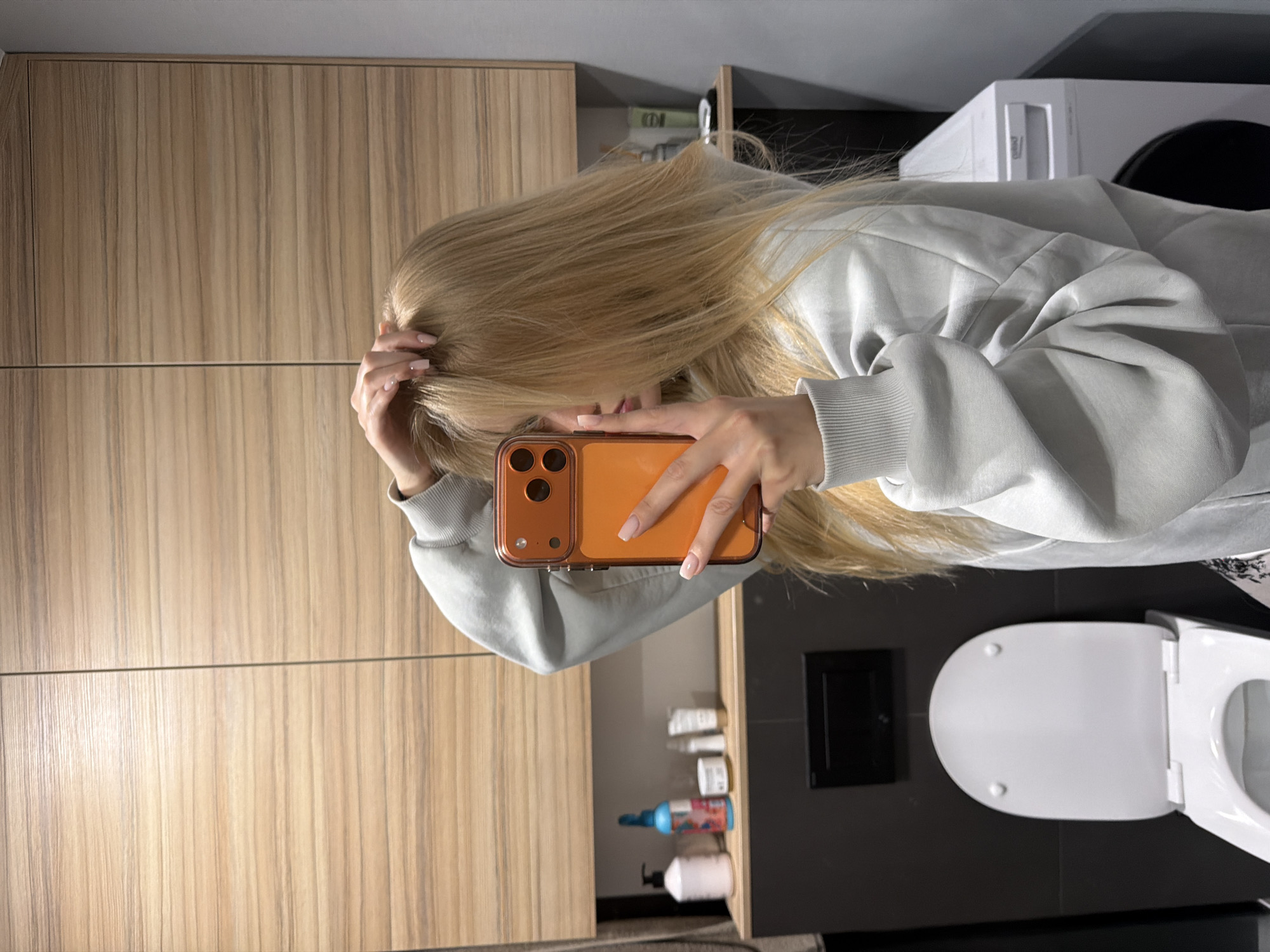 Evening routine captured: bathroom selfie, bedroom video watching session
