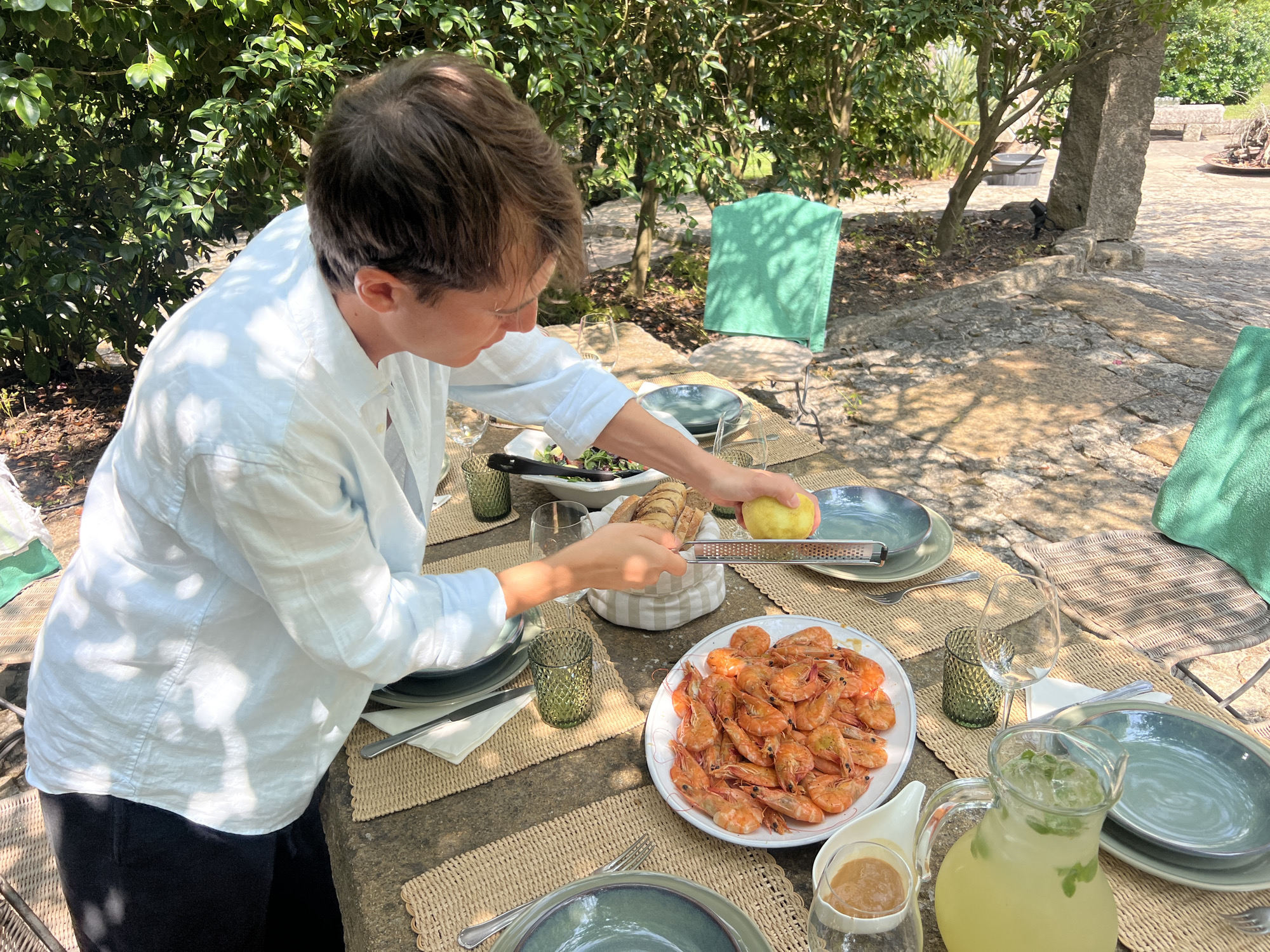 Lemon grating at a laid outdoor table in northern Portugal