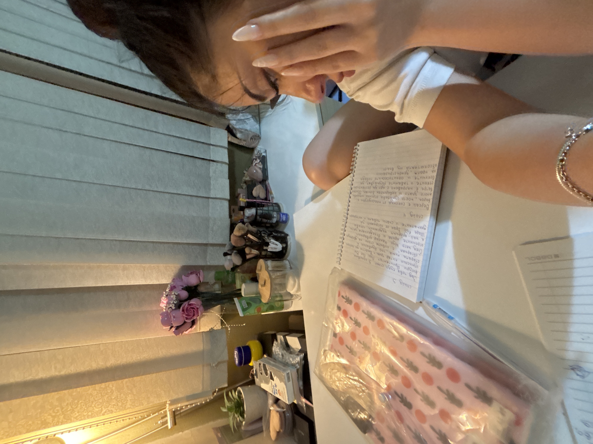 Student studies, takes selfies during homework session in Plovdiv