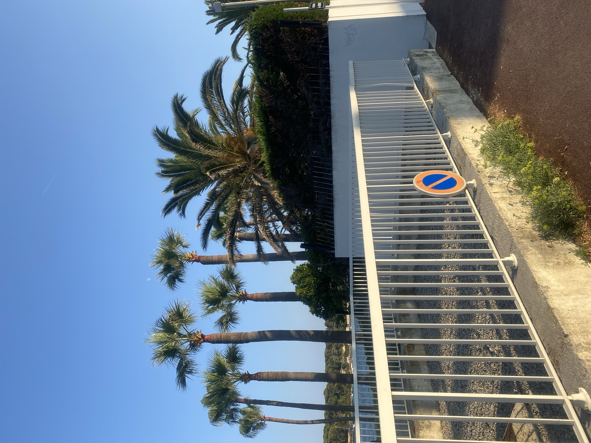 Afternoon stroll along Antibes coastline and quiet residential streets