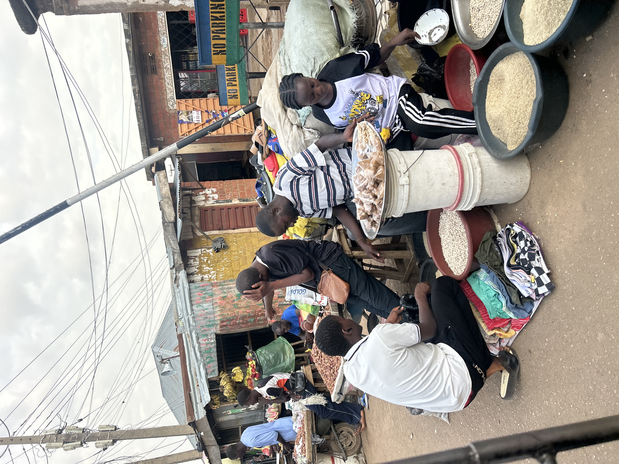 Young peanut vendors operate at Jos, Nigeria market