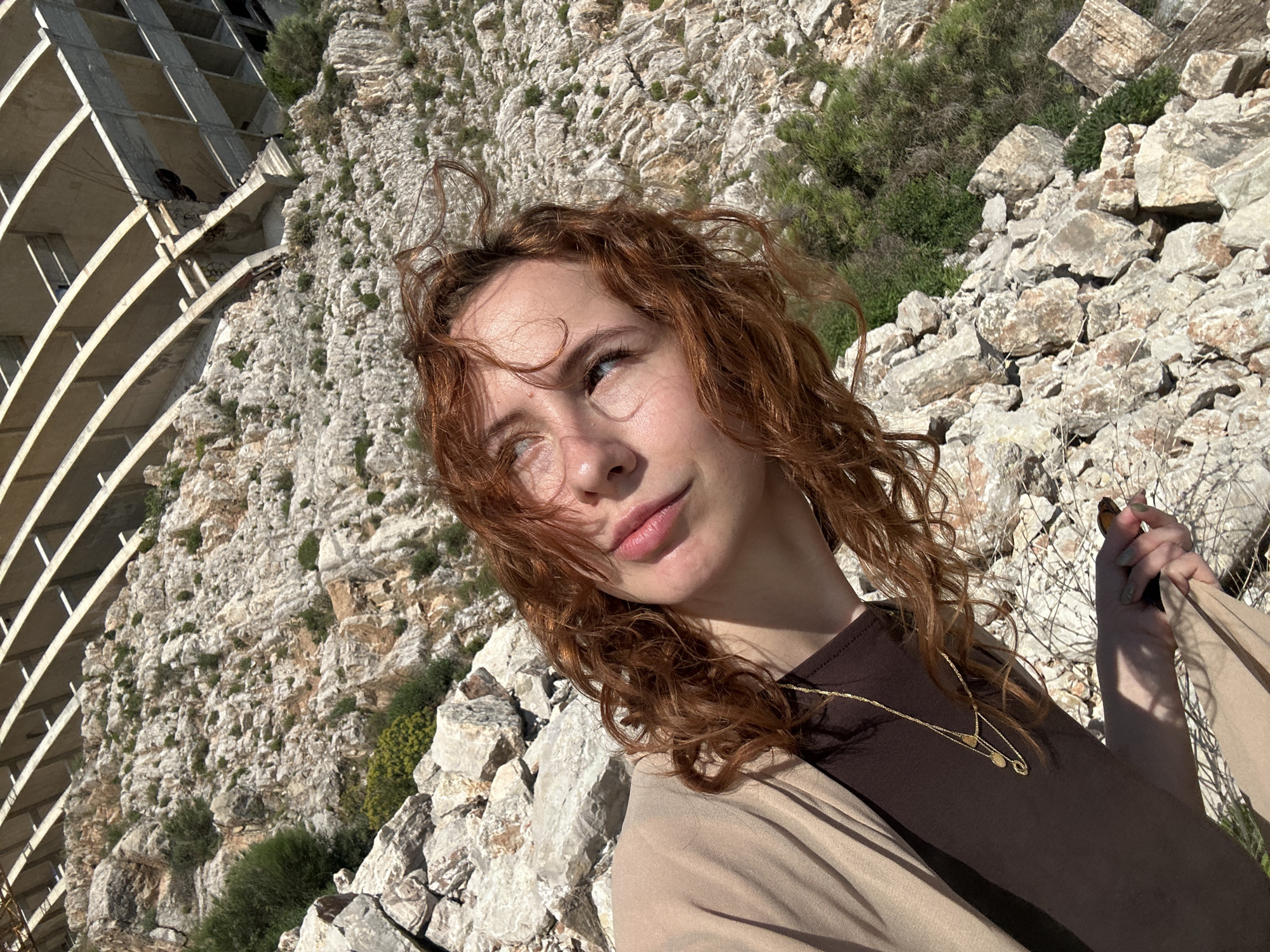Woman photographed on cliff in Perazića Do, Montenegro