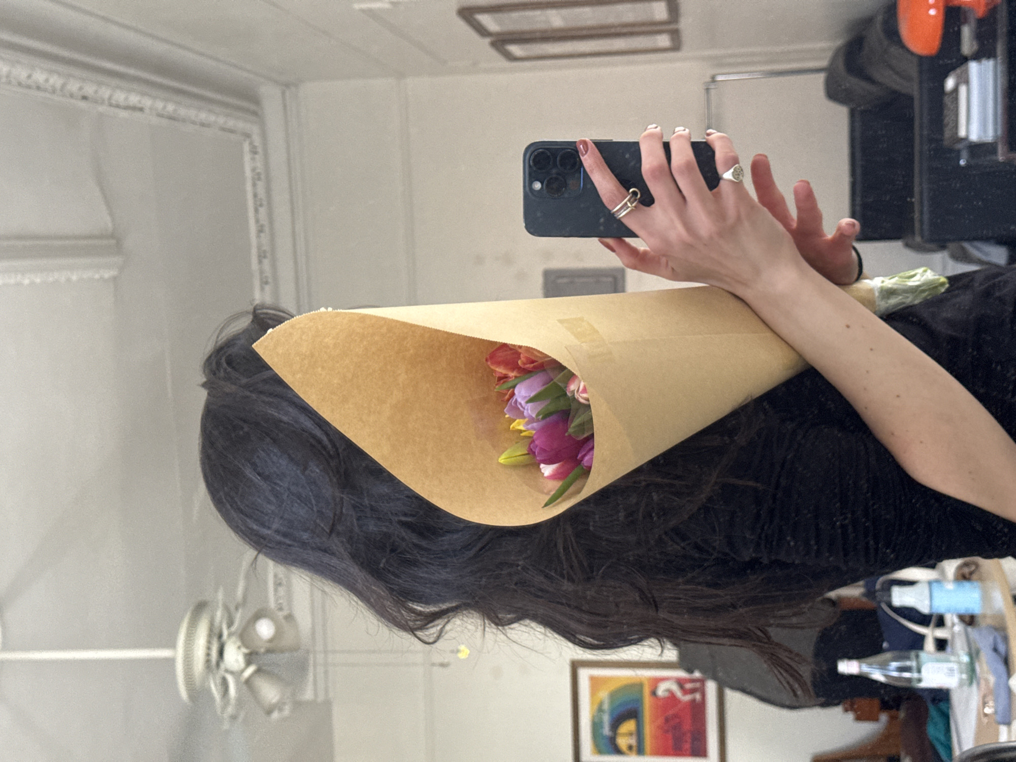 Woman Takes Mirror Selfies with Tulips in New York