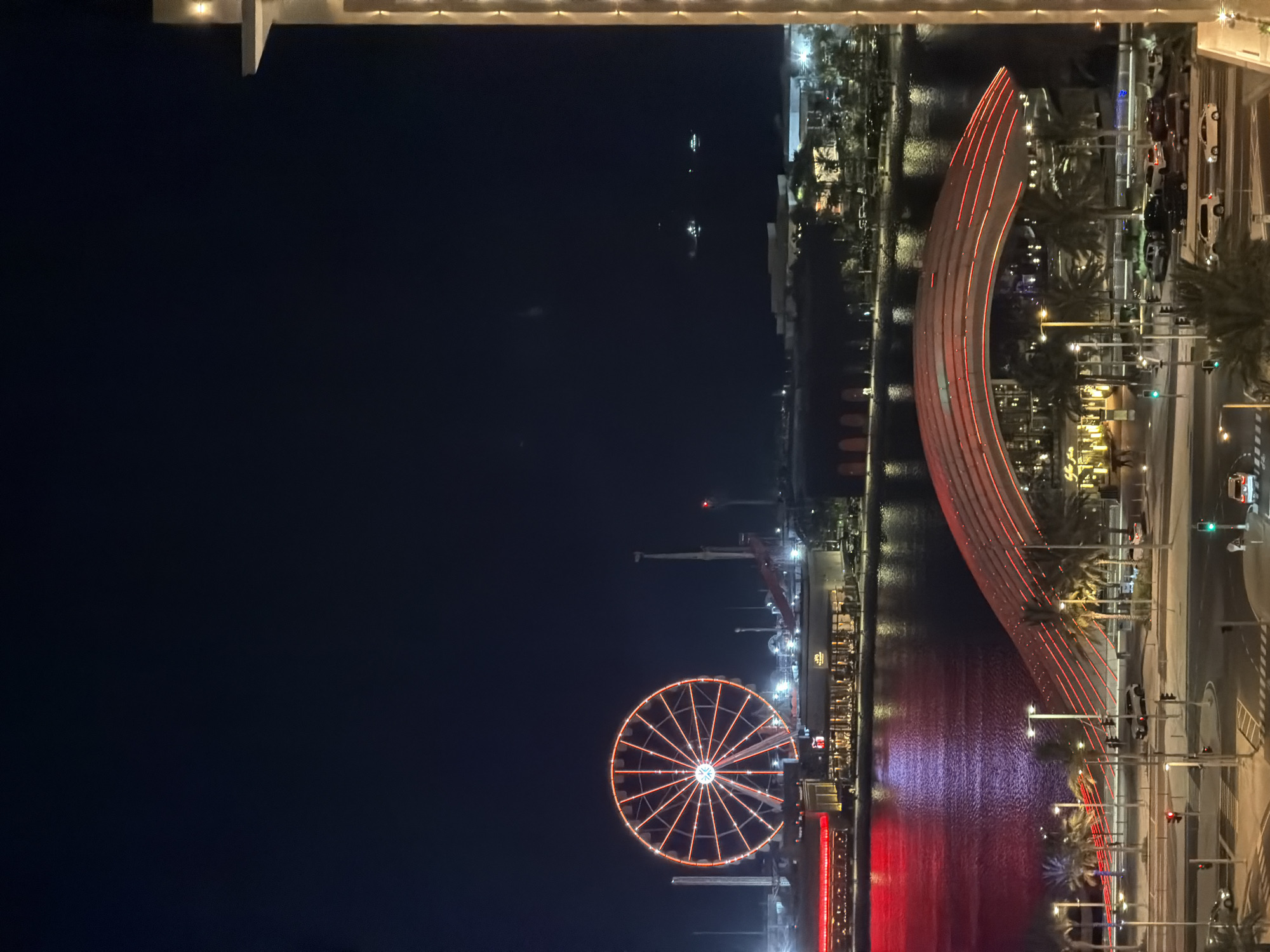 Lusail waterfront glows at night from above