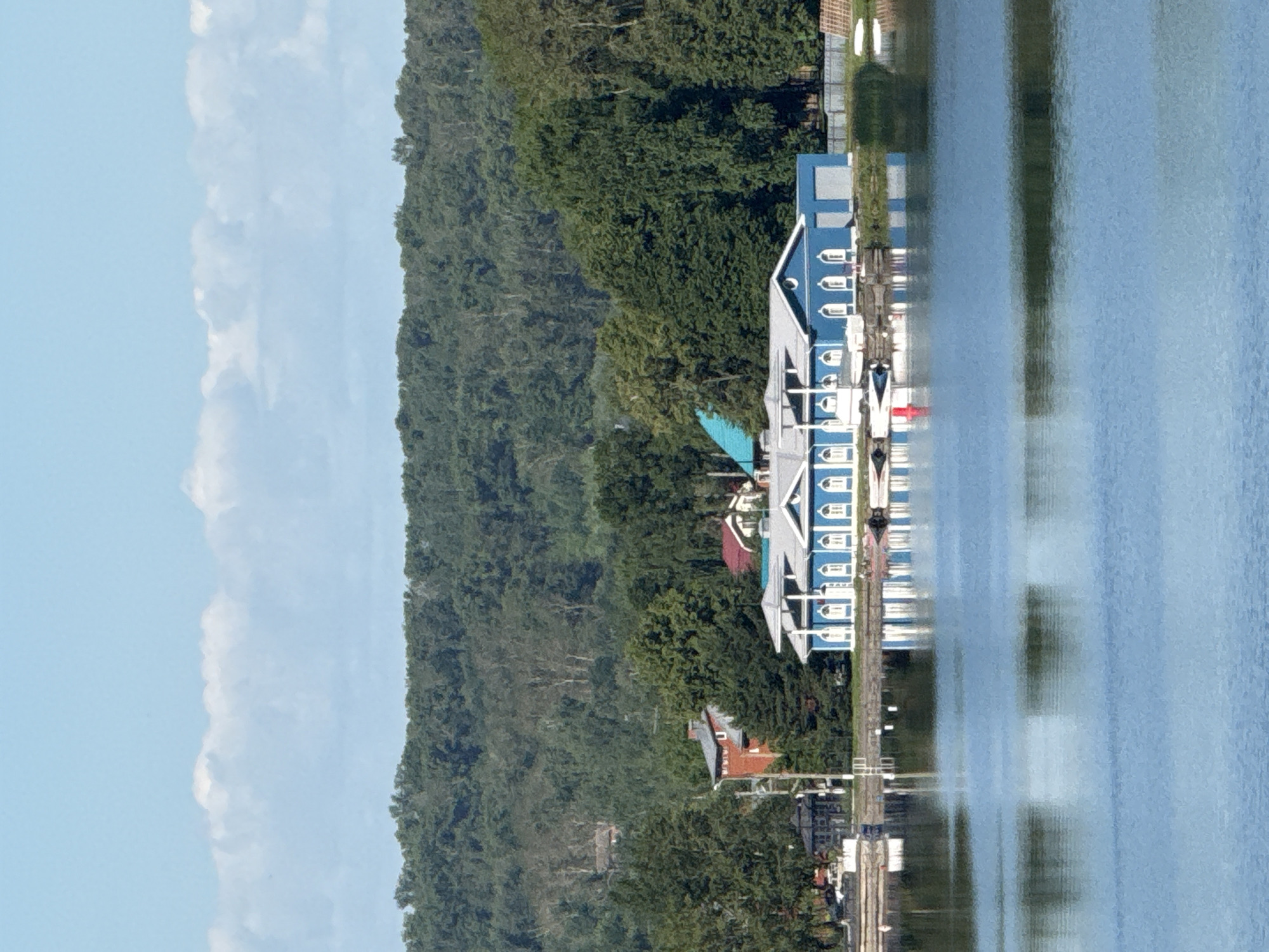Quiet lakeside residential waterfront on a clear Votkinsk morning