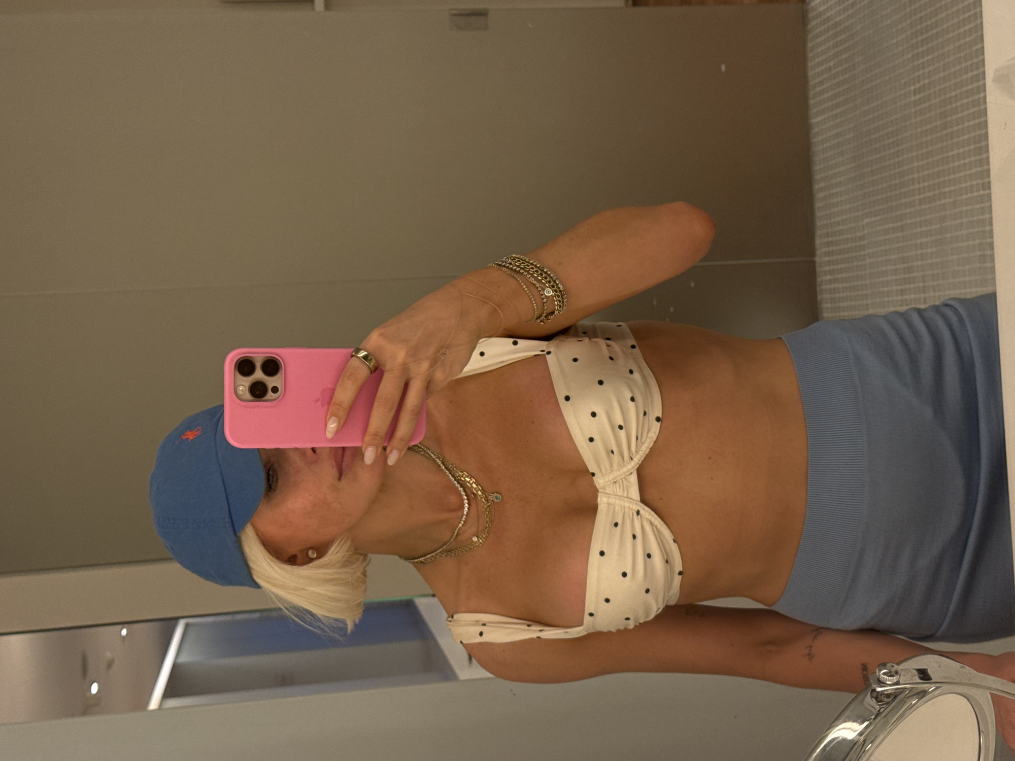 Woman takes bathroom selfie on Miami Beach