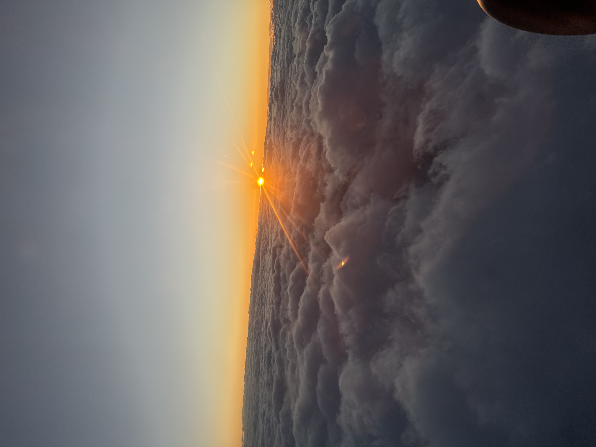 Aerial sunrise captured above clouds near Lakatnik, Bulgaria