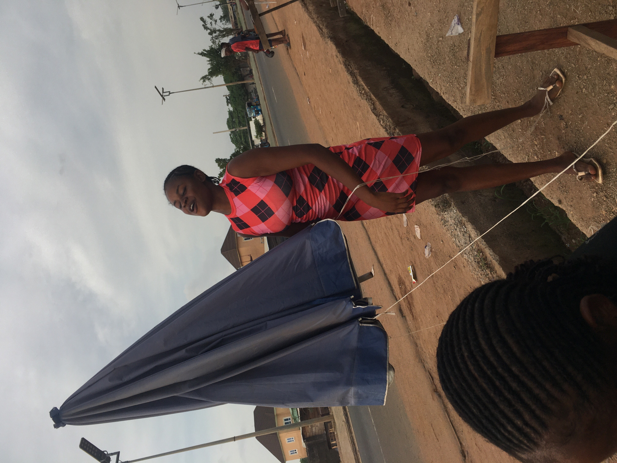 Women gather on roadside in Abakaliki, Nigeria