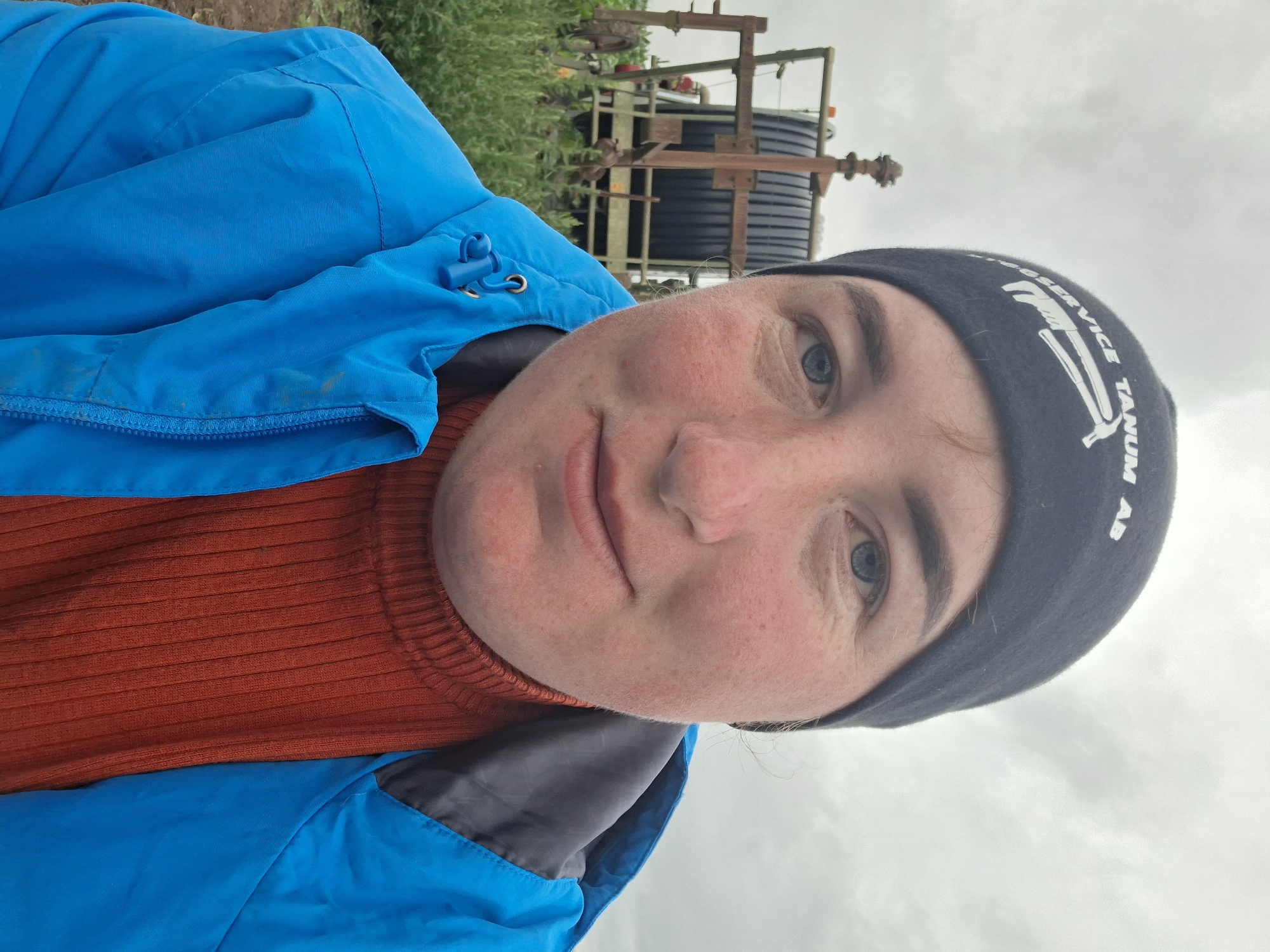 Cycling through rural farmland, stork nest and crops along the way